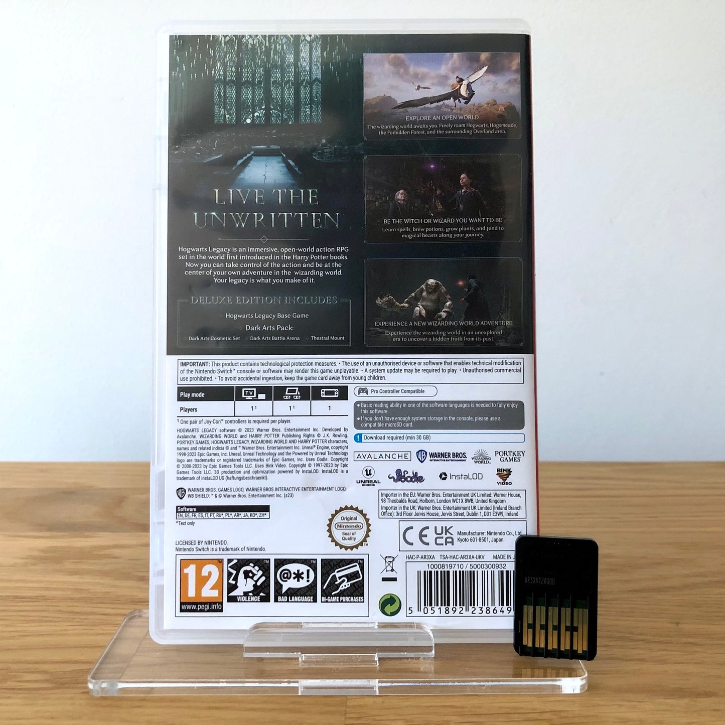 Back cover of Hogwarts Legacy for Nintendo Switch, showing game details, features, and back of cartridge.