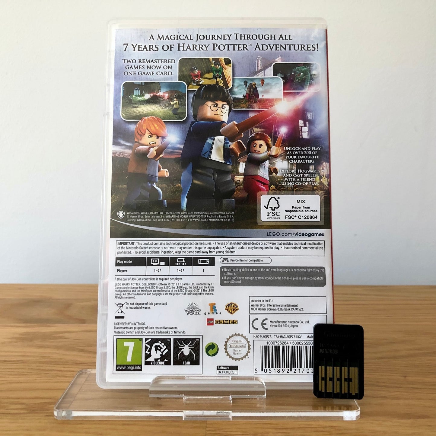 Back cover of LEGO Harry Potter Collection for Nintendo Switch, showing game details, features, and back of cartridge.