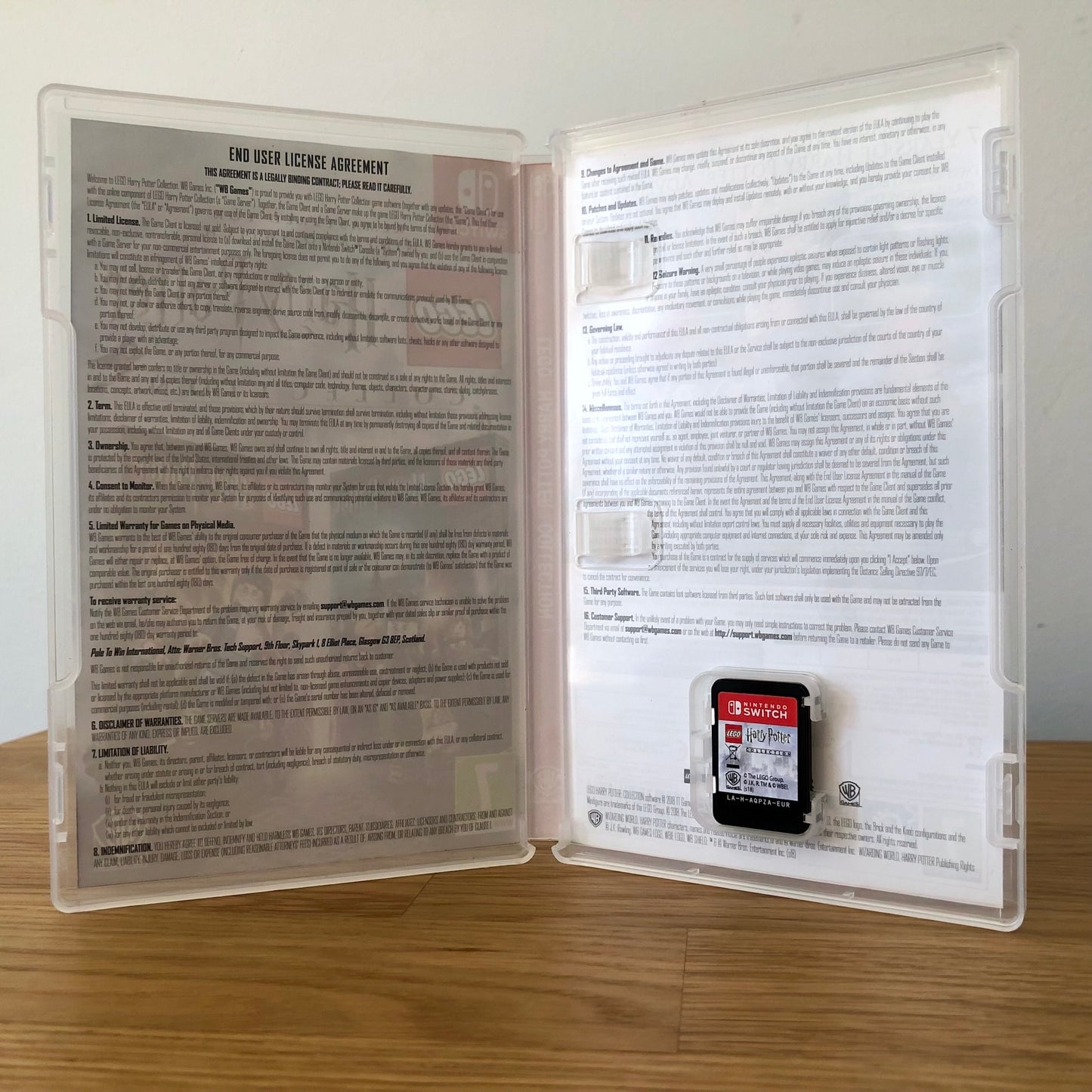 Inside the case of LEGO Harry Potter Collection for Nintendo Switch, showing the cartridge and case design.
