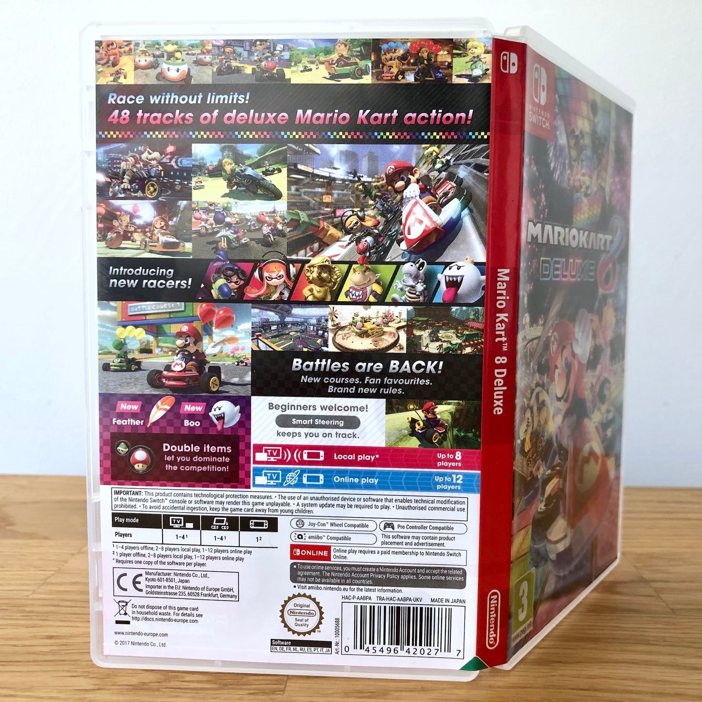 Angled back view of Mario Kart 8 Deluxe for Nintendo Switch, showing full back cover artwork.