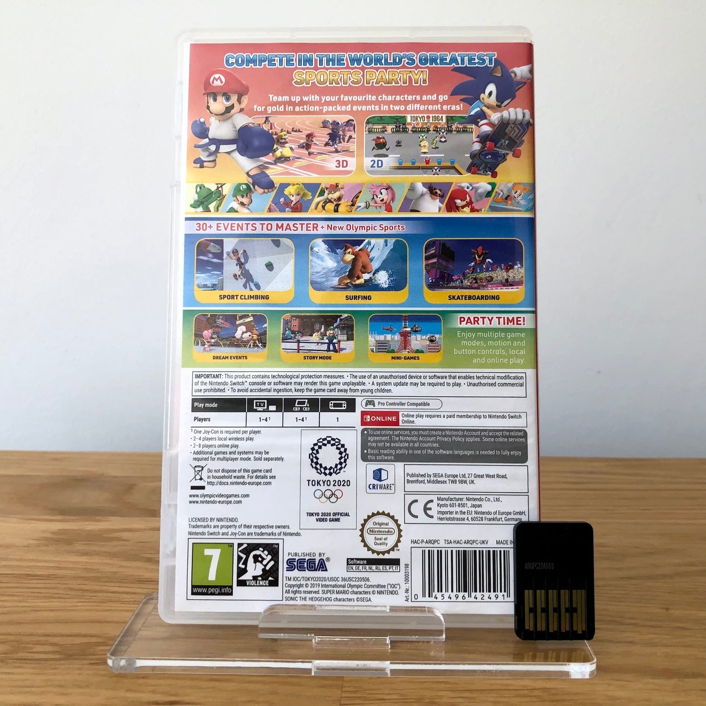Back cover of Mario & Sonic at the Olympic Games: Tokyo 2020 for Nintendo Switch, showing game details, features, and back of cartridge.