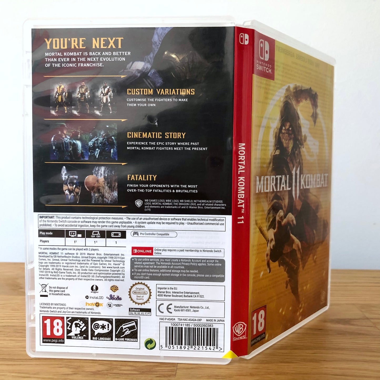 Angled back view of Mortal Kombat 11 for Nintendo Switch, showing full back cover artwork.