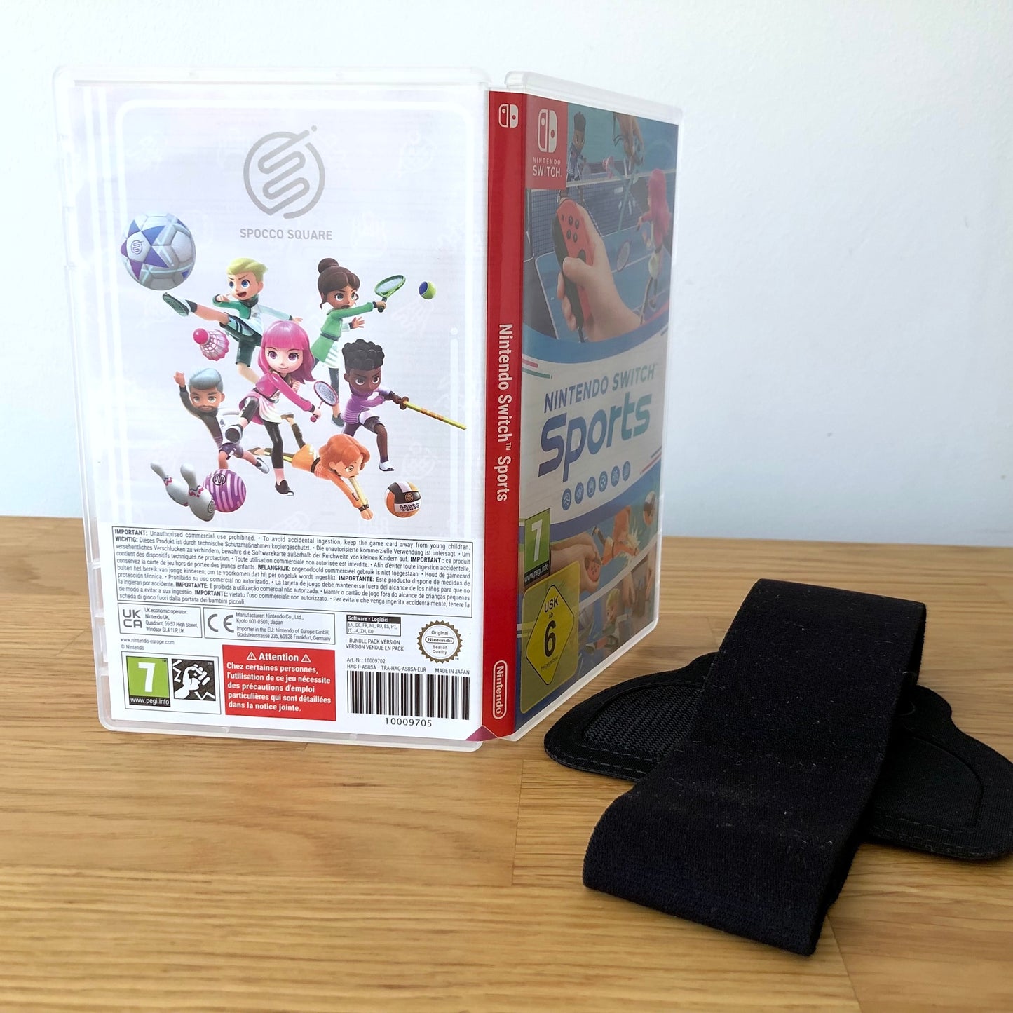 Angled back view of Nintendo Switch Sports for Nintendo Switch, displaying full back artwork and Nintendo leg strap.