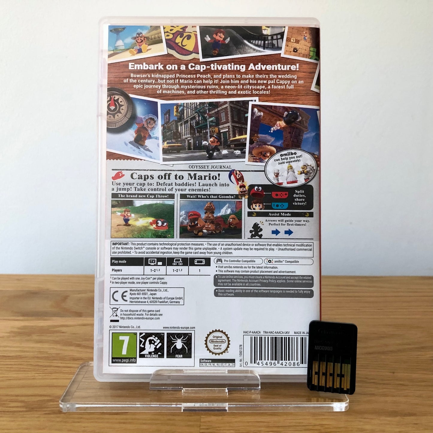 Back cover of Super Mario Odyssey for Nintendo Switch, showing game details, features, and back of cartridge.