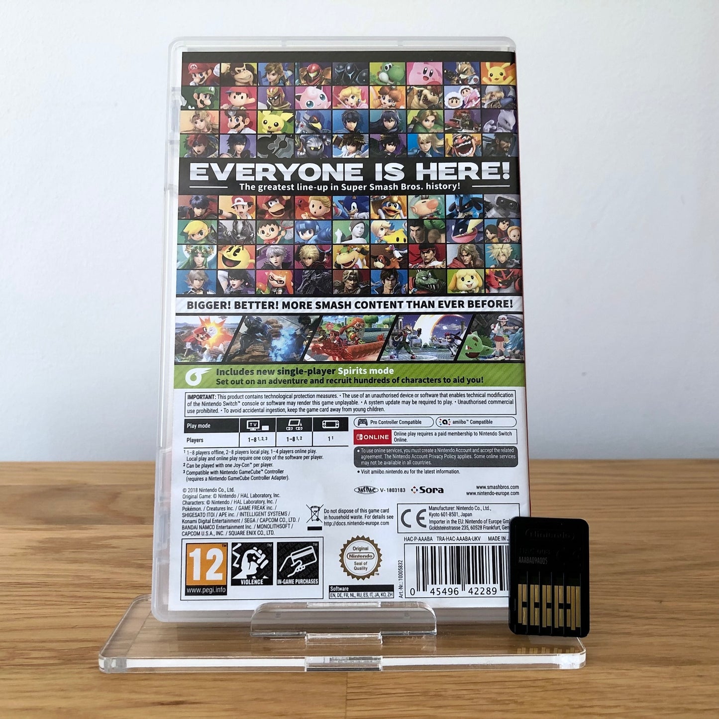 Back cover of Super Smash Bros. Ultimate for Nintendo Switch, showing game details, features, and back of cartridge.