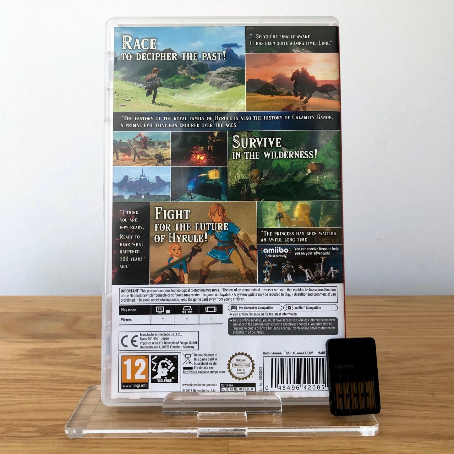 Back cover of The Legend of Zelda: Breath of the Wild for Nintendo Switch, showing game details, features, and back of cartridge.