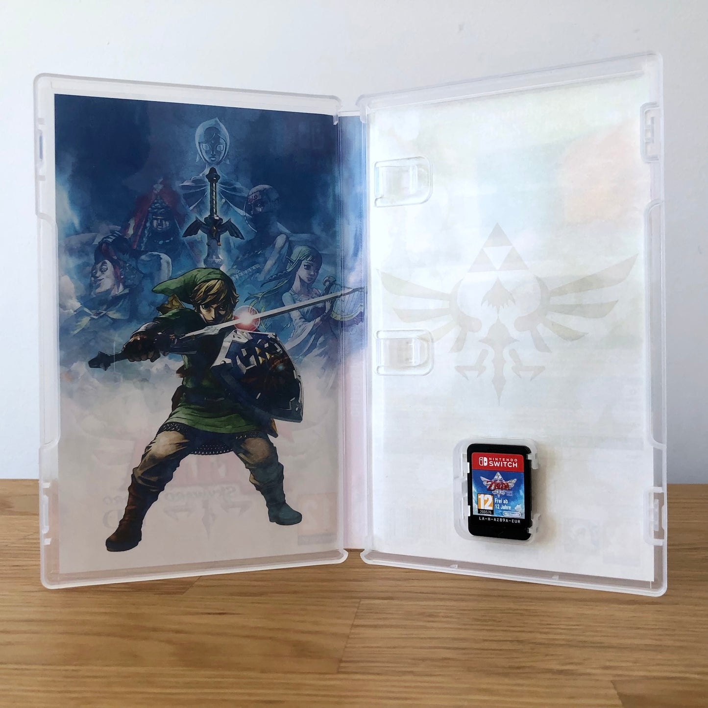 Inside the case of The Legend of Zelda: Skyward Sword HD for Nintendo Switch, showing the cartridge and case design.