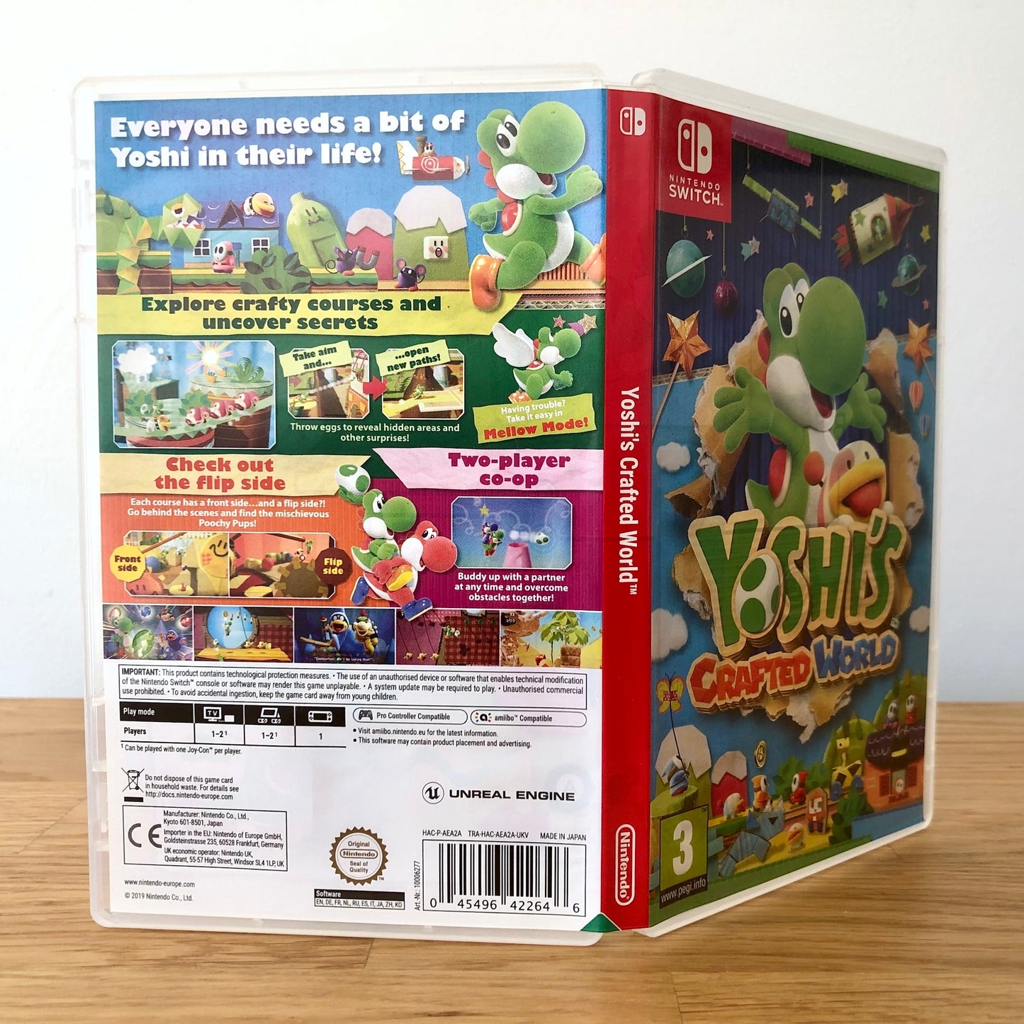 Angled back view of Yoshi's Crafted World for Nintendo Switch, showing full back cover artwork.