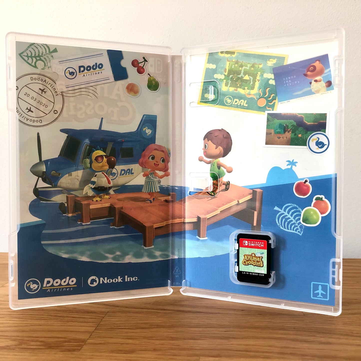 Inside the case of Animal Crossing: New Horizons for Nintendo Switch, showing the cartridge and case design.