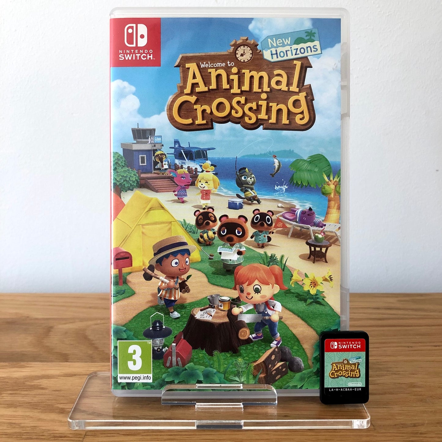 Front cover of Animal Crossing: New Horizons for Nintendo Switch, featuring game artwork and title.