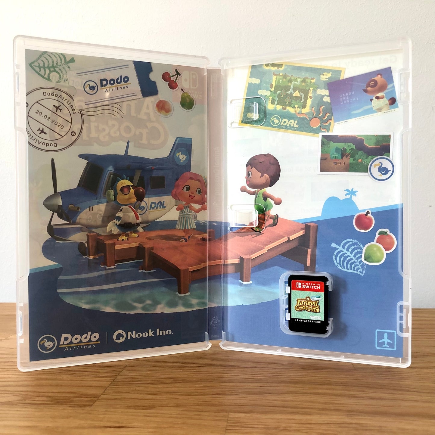Inside the case of Animal Crossing: New Horizons for Nintendo Switch, showing the cartridge and case design.