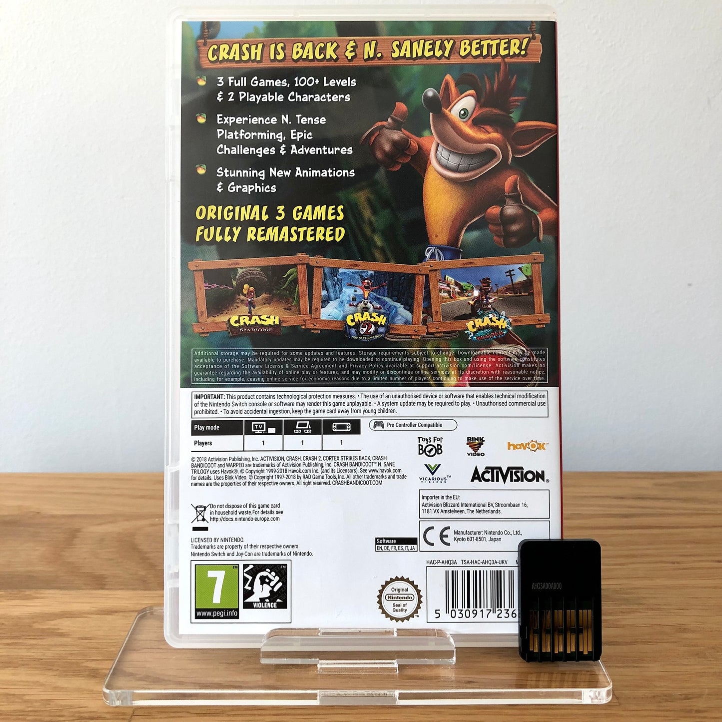 Back cover of Crash Bandicoot N-Sane Trilogy for Nintendo Switch, showing game details, features, and back of cartridge.