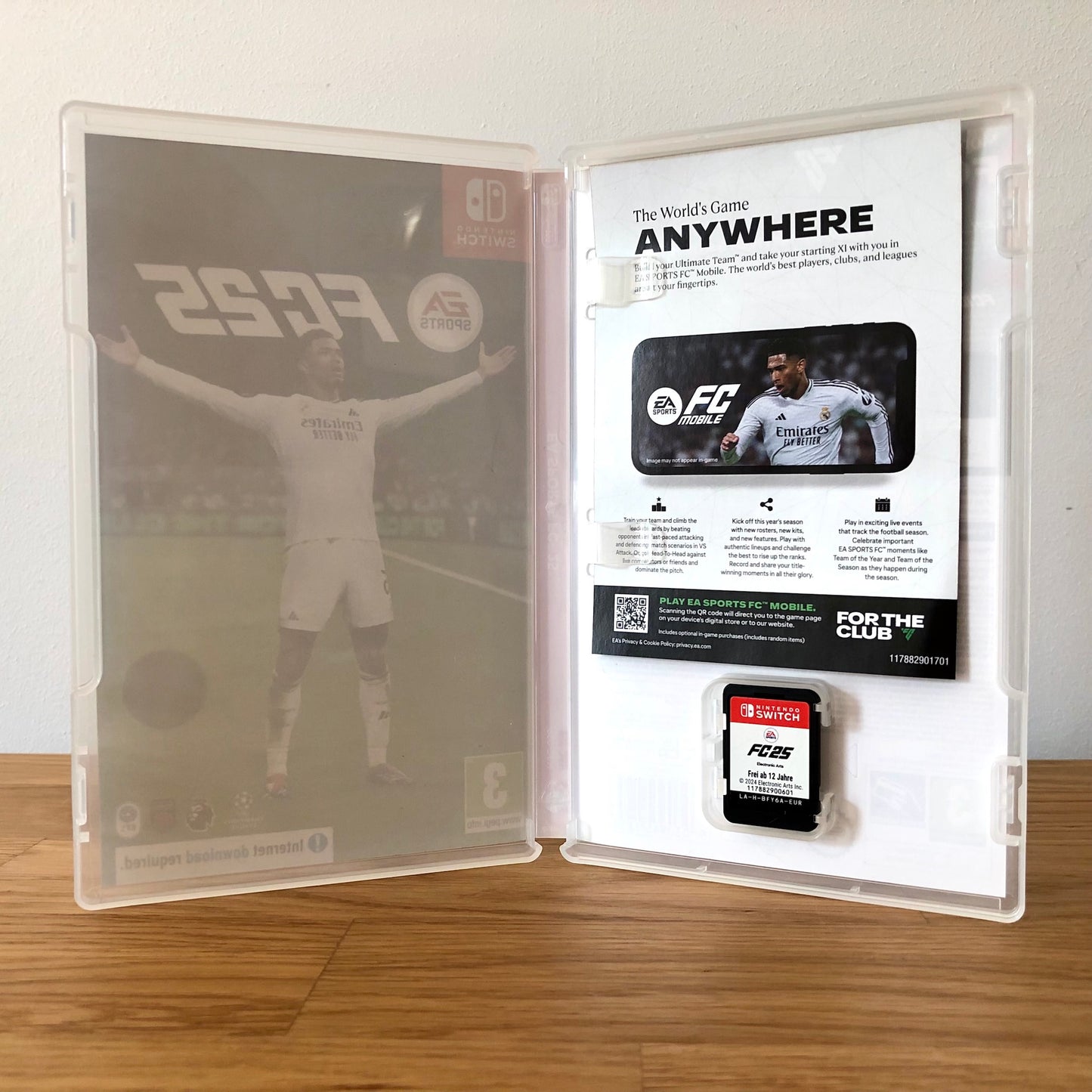 Inside the case of FC 25 for Nintendo Switch, showing the cartridge and case design.