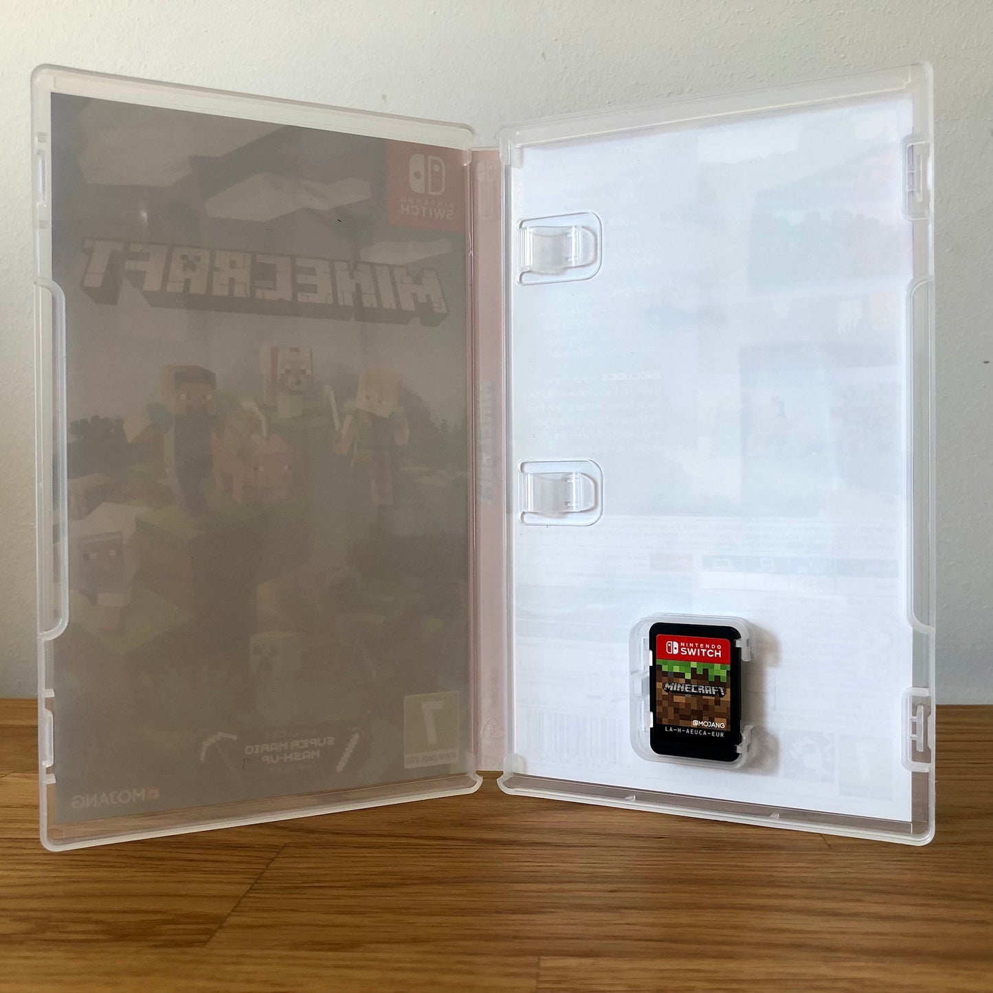 Inside the case of Minecraft for Nintendo Switch, showing the cartridge and case design.