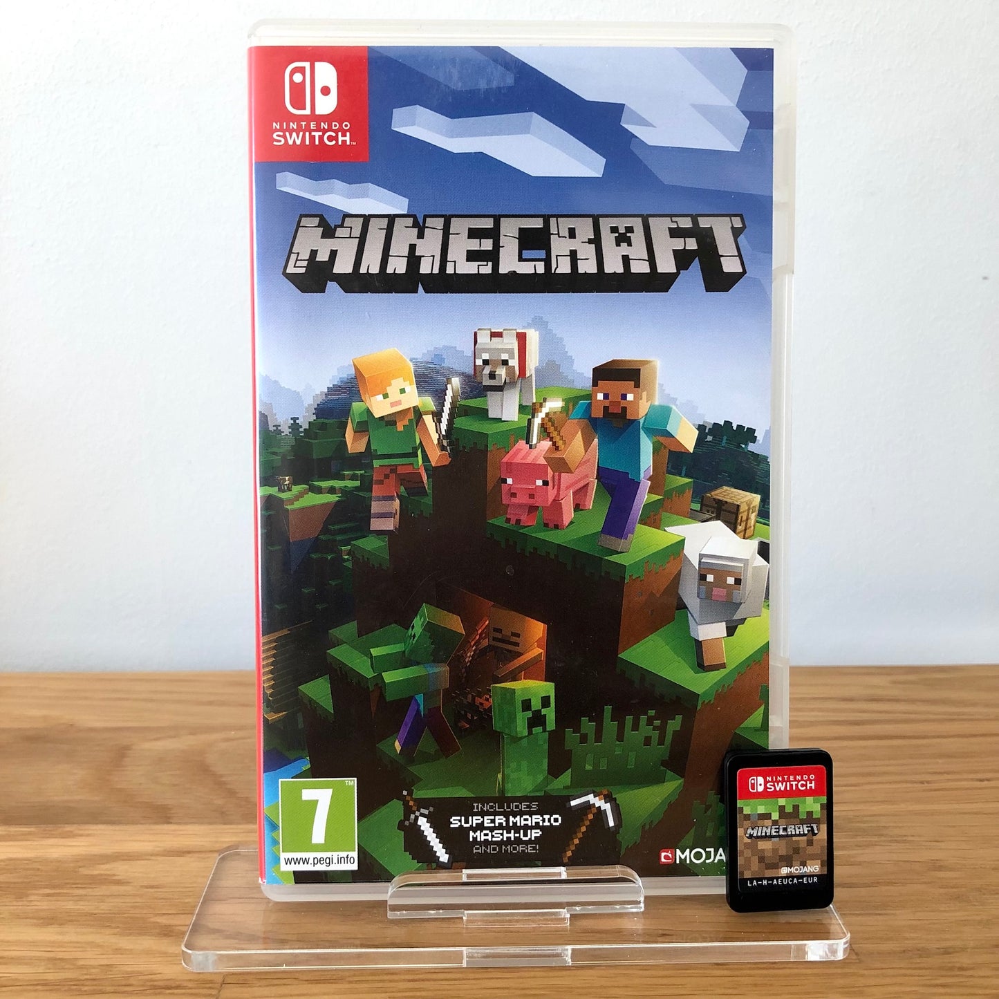 Front case cover of Minecraft for Nintendo Switch, featuring game artwork, title, and front of cartridge.