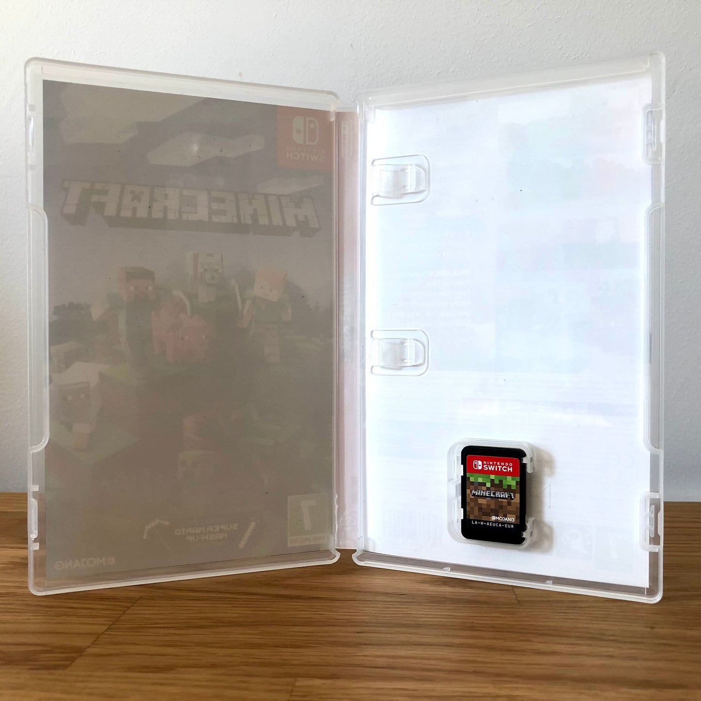 Inside the case of Minecraft for Nintendo Switch, showing the cartridge and case design.