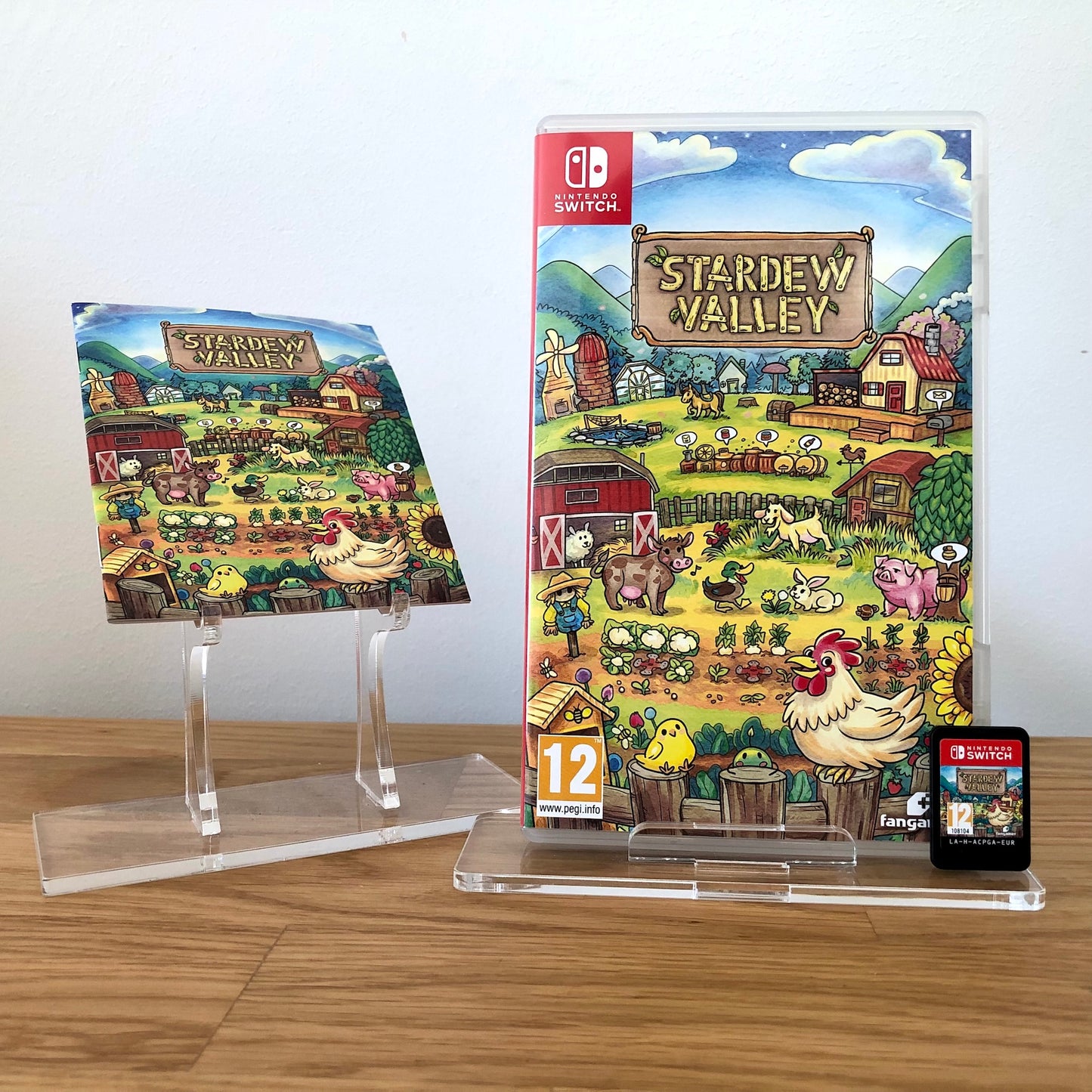 Front case cover of Stardew Valley for Nintendo Switch, featuring game artwork, title, game manual and front of cartridge.