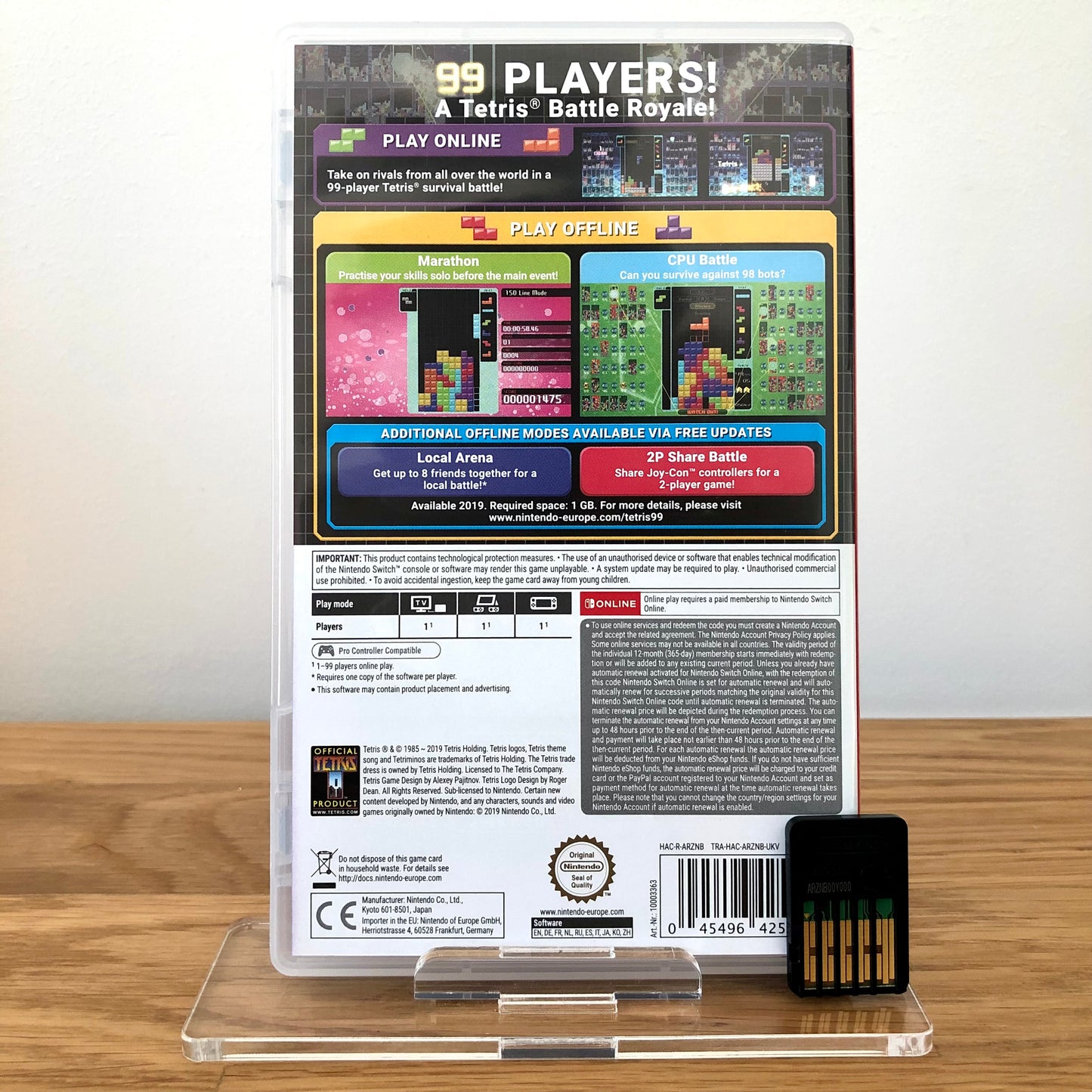 Back case cover of Tetris 99 for Nintendo Switch, showing game details, features, and back of cartridge.