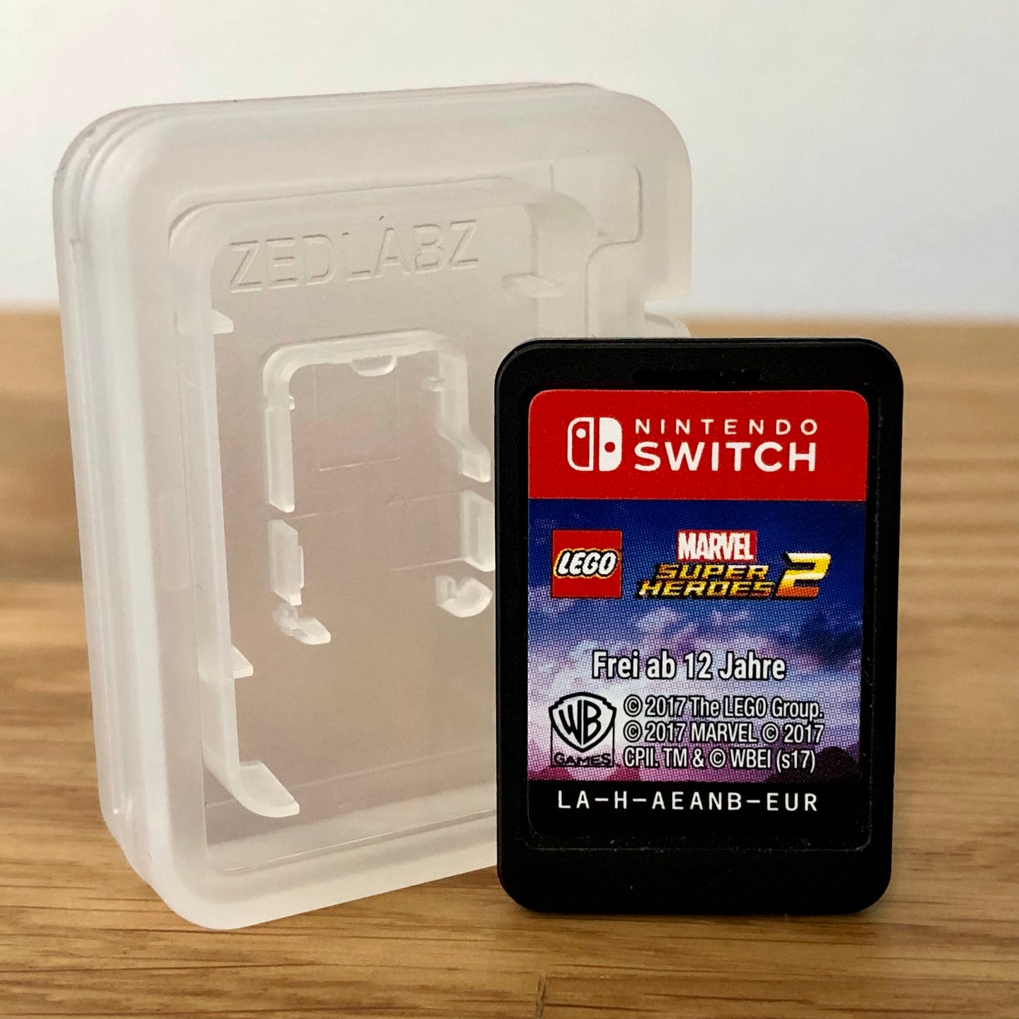 Cartridge front of LEGO Marvel Superheroes 2 for Nintendo Switch, featuring game title.
