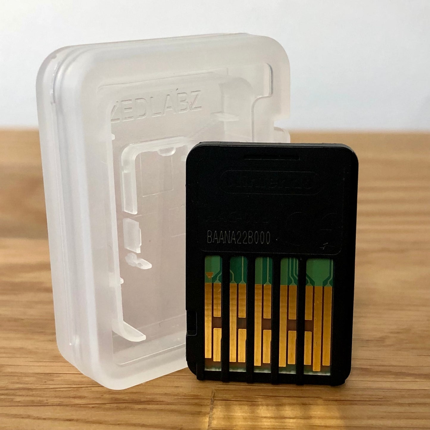 Cartridge back of Mario + Rabbids Kingdom Battle for Nintendo Switch, showing data pins.