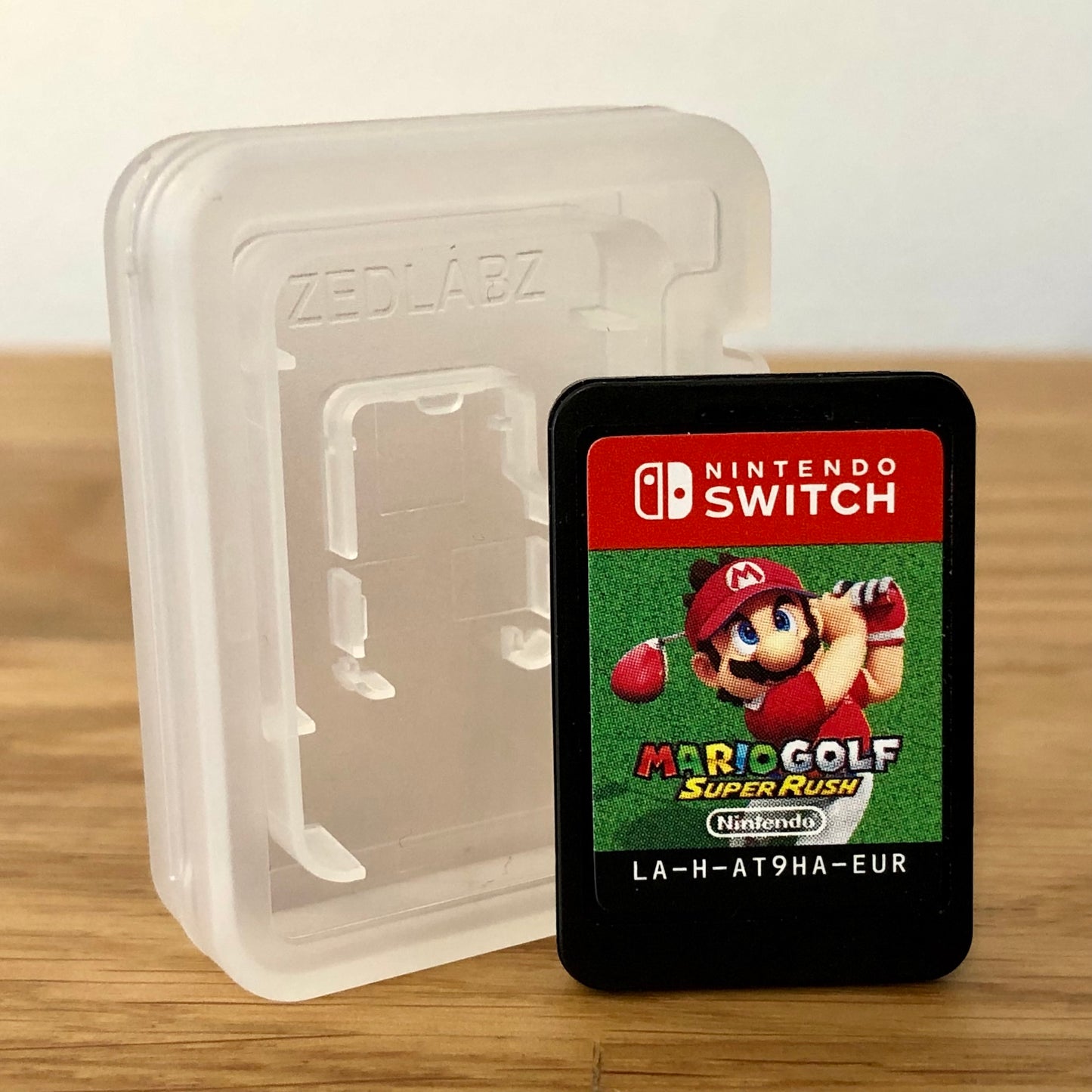 Cartridge front of Mario Golf: Super Rush for Nintendo Switch, featuring game title.