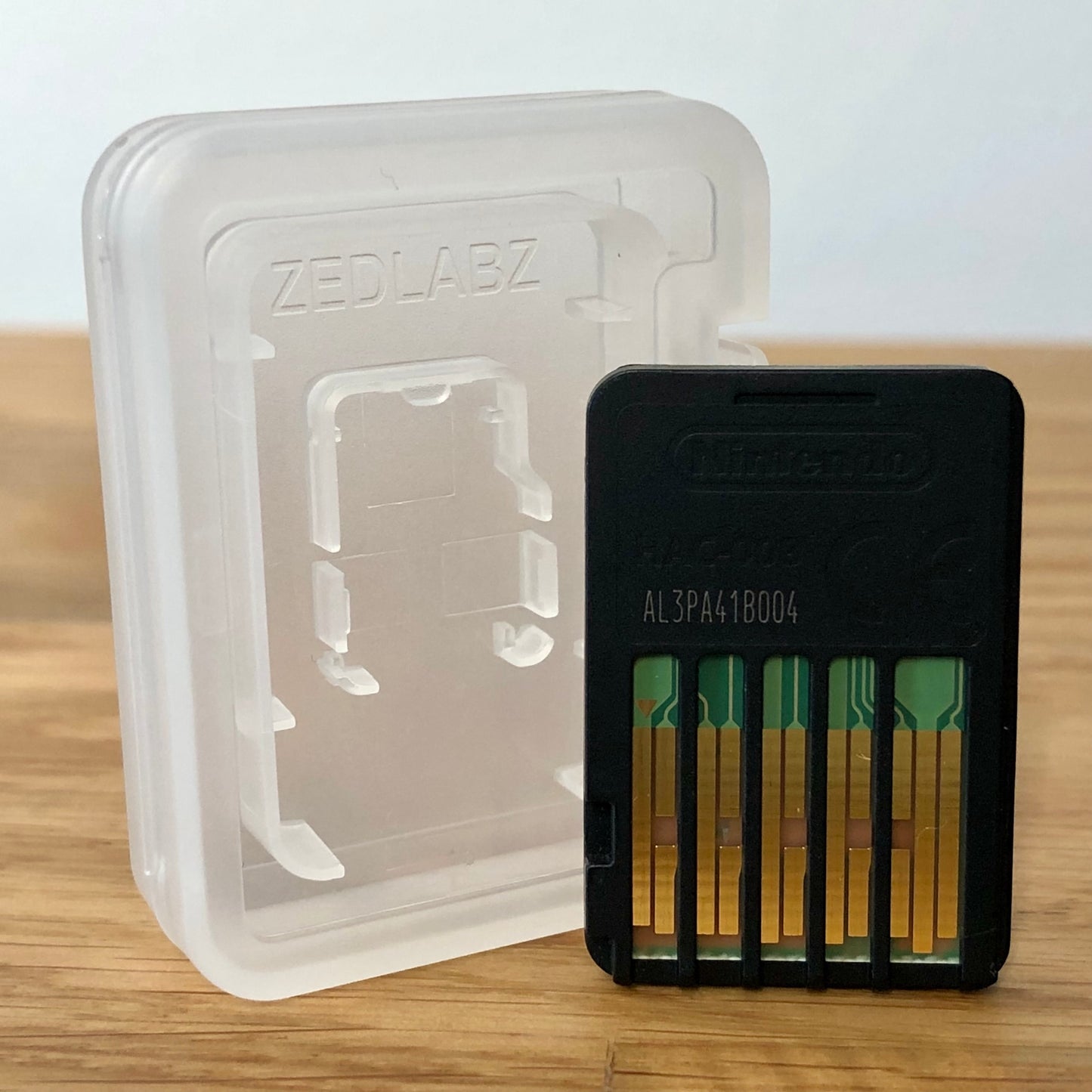 Cartridge back of Ring fit adventure for Nintendo Switch, showing data pins.