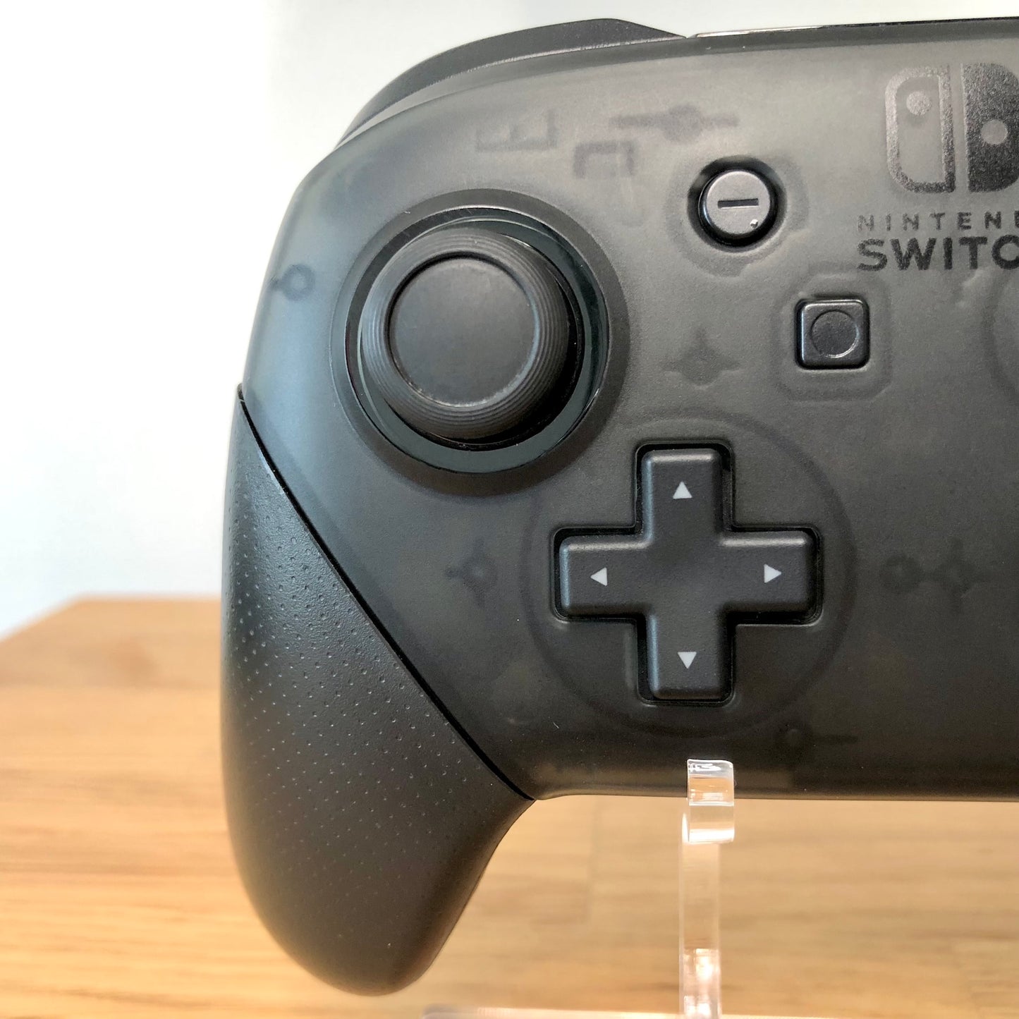 Close up view of Nintendo Switch Pro Controller left side. Highlighting the right side buttons condition.