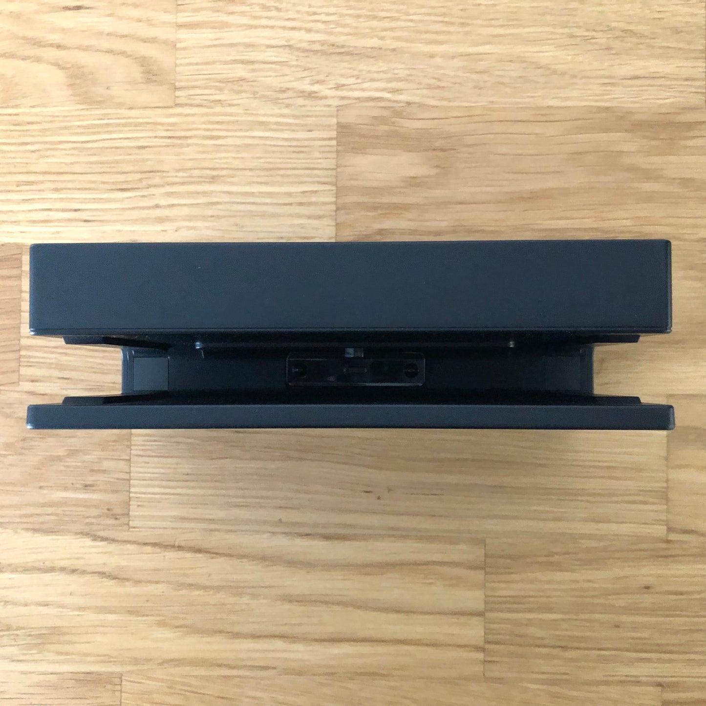 Top-down view of the of Nintendo Switch dock with, showing console connection port.