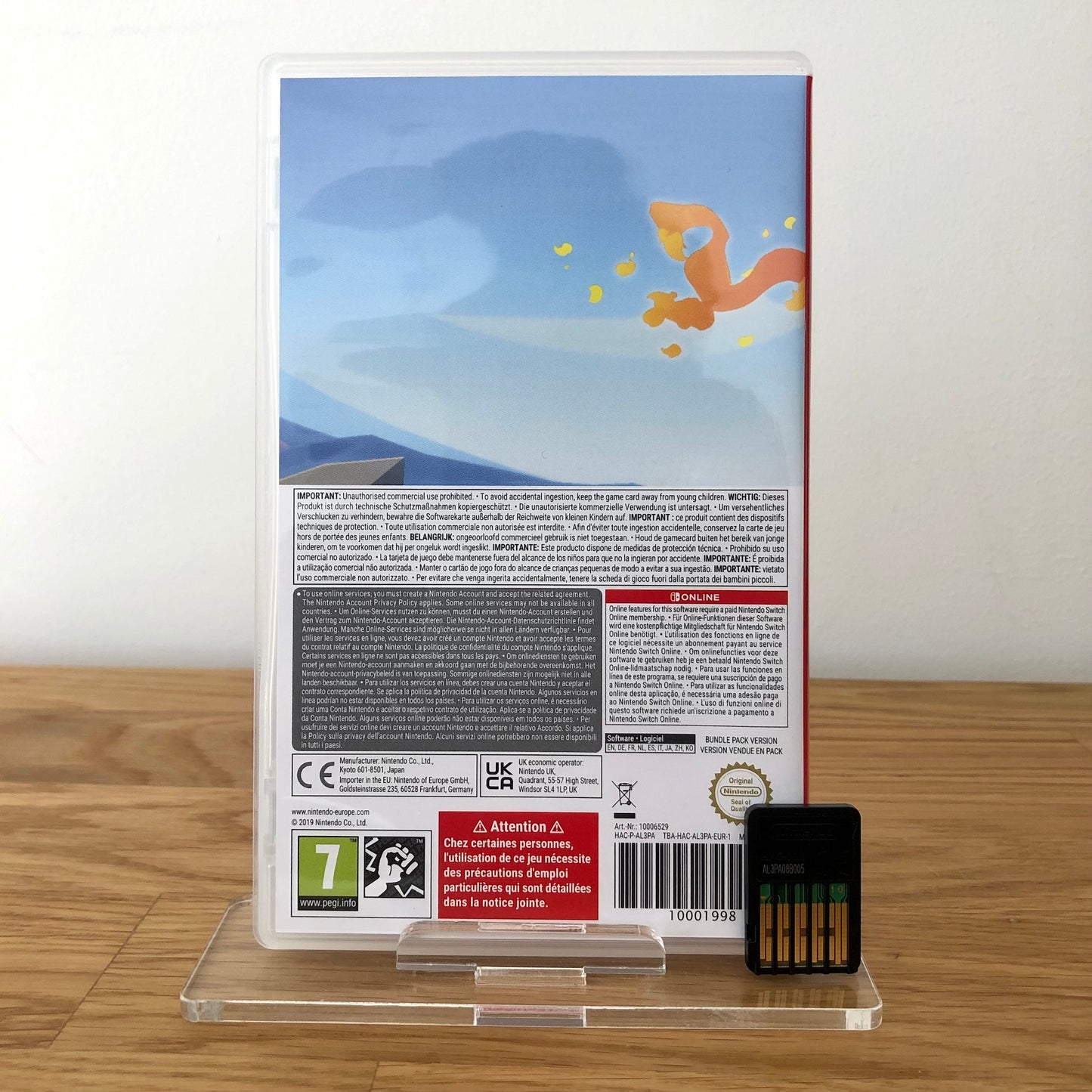 Back case cover of Ring fit adventure for Nintendo Switch, showing game details, features, and back of cartridge.