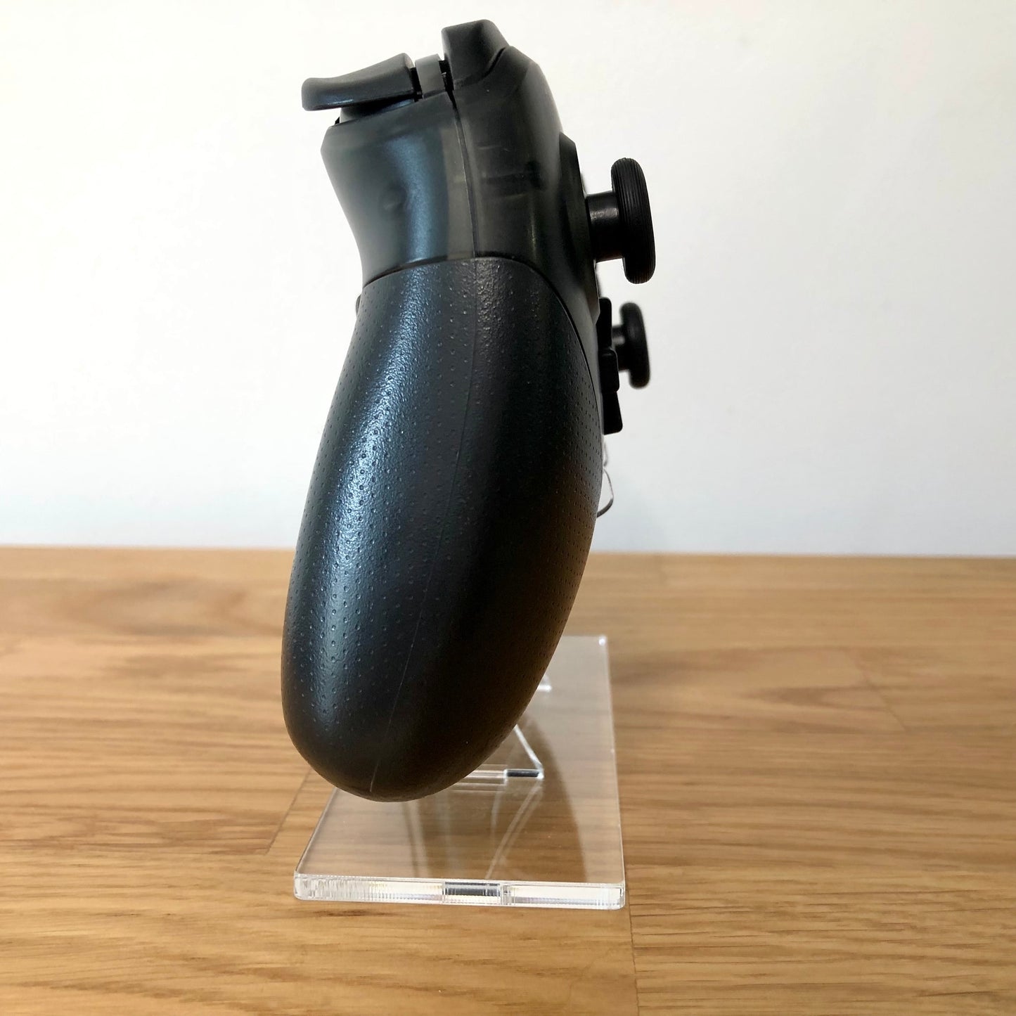 Side view of Nintendo Switch Pro Controller.
