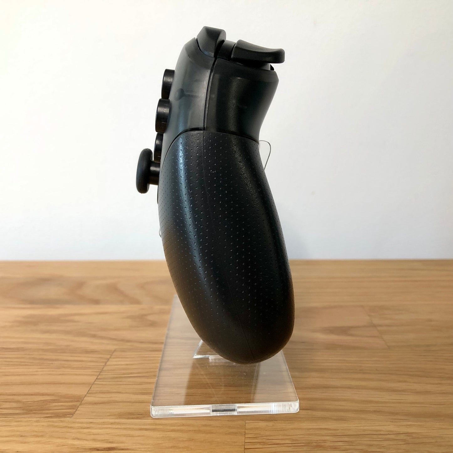 Side view of Nintendo Switch Pro Controller.