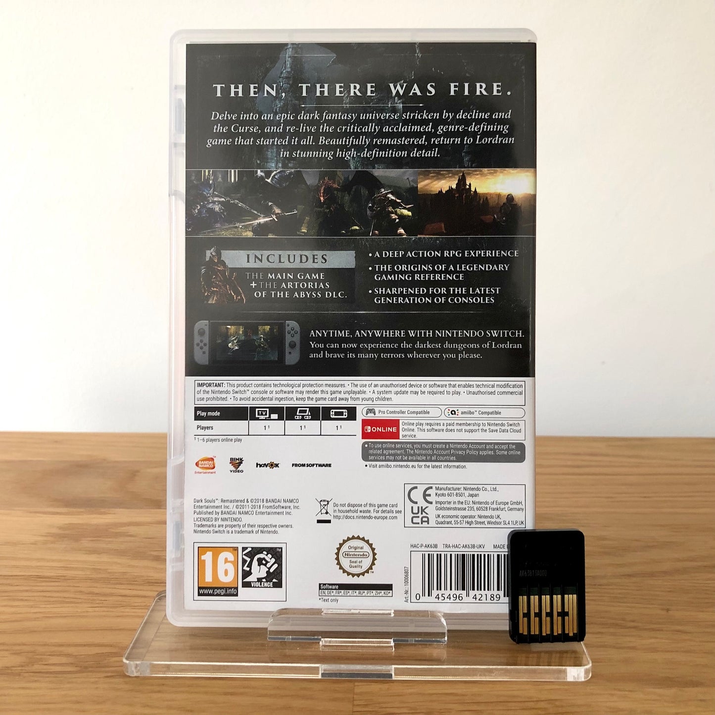 Back cover of Dark Souls Remastered for Nintendo Switch, showing game details, features, and back of cartridge.