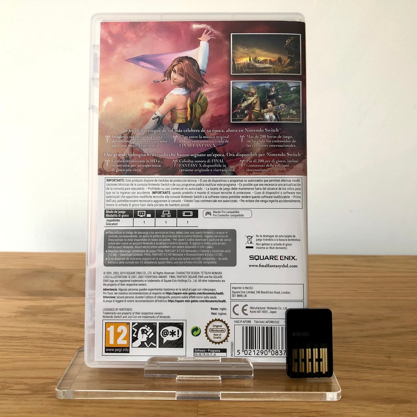 Back cover of Final Fantasy X/X-2 HD Remaster for Nintendo Switch, showing game details, features, and back of cartridge.