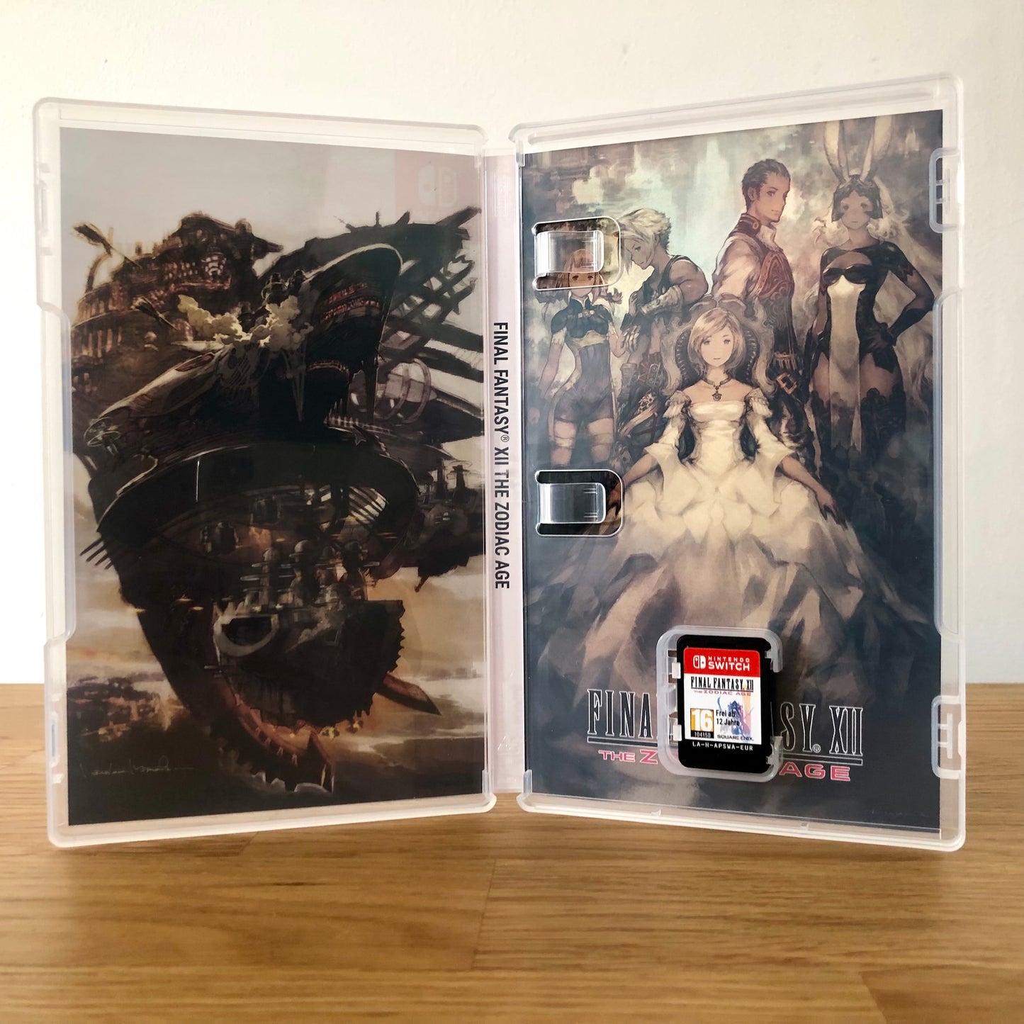 Inside the case of Final Fantasy XII The Zodiac Age for Nintendo Switch, showing the cartridge and case design.