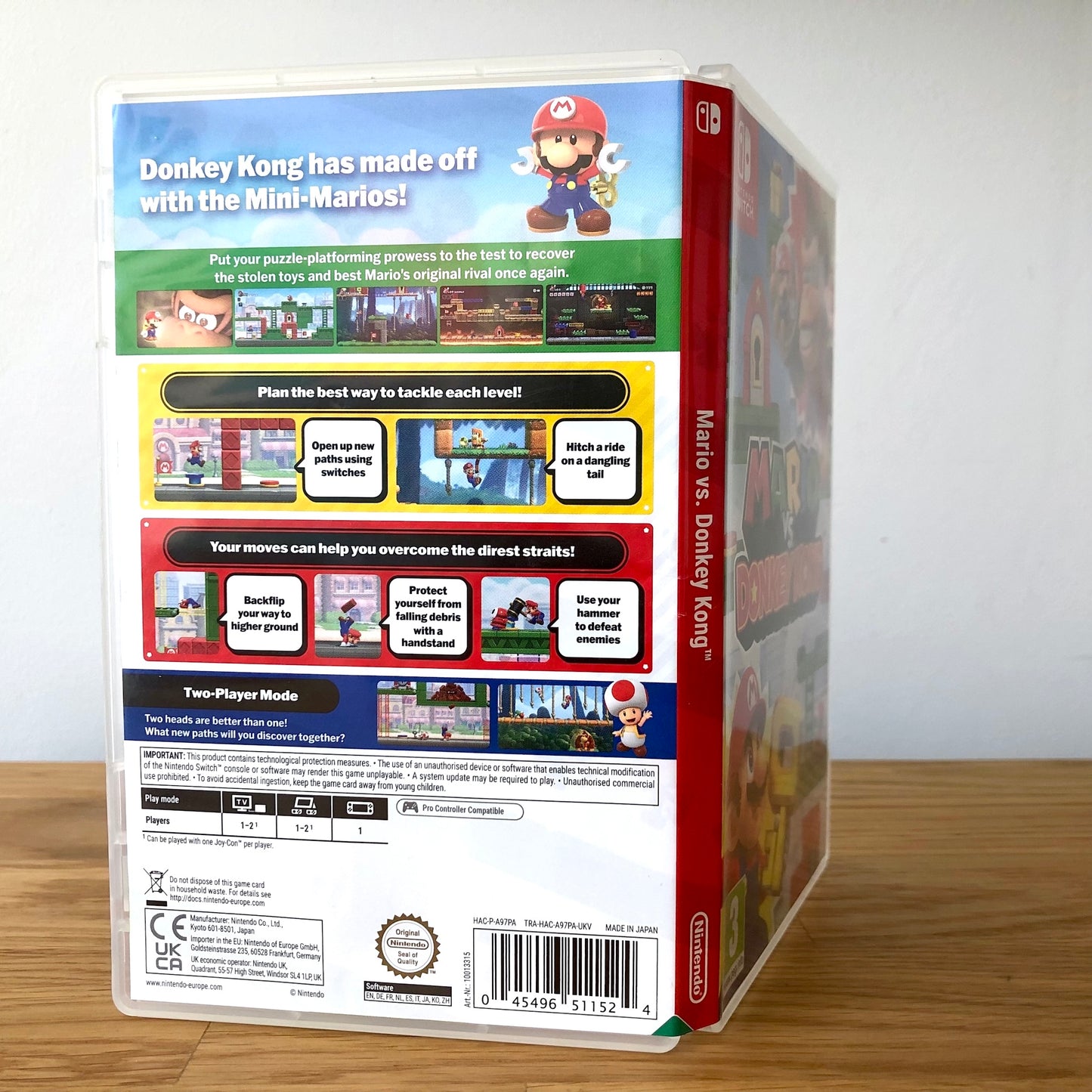 Angled back view of Mario vs Donkey Kong for Nintendo Switch, showing full back cover artwork.