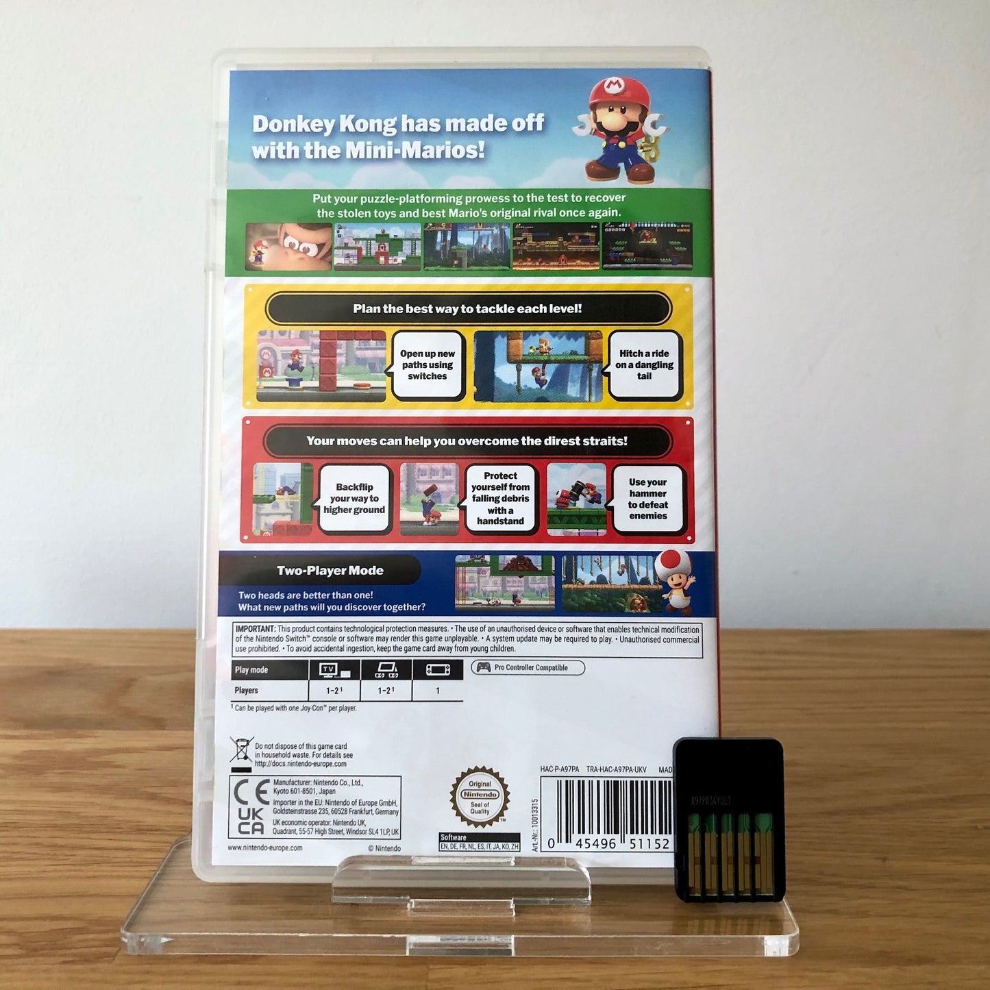 Back cover of Mario vs Donkey Kong for Nintendo Switch, showing game details, features, and back of cartridge.