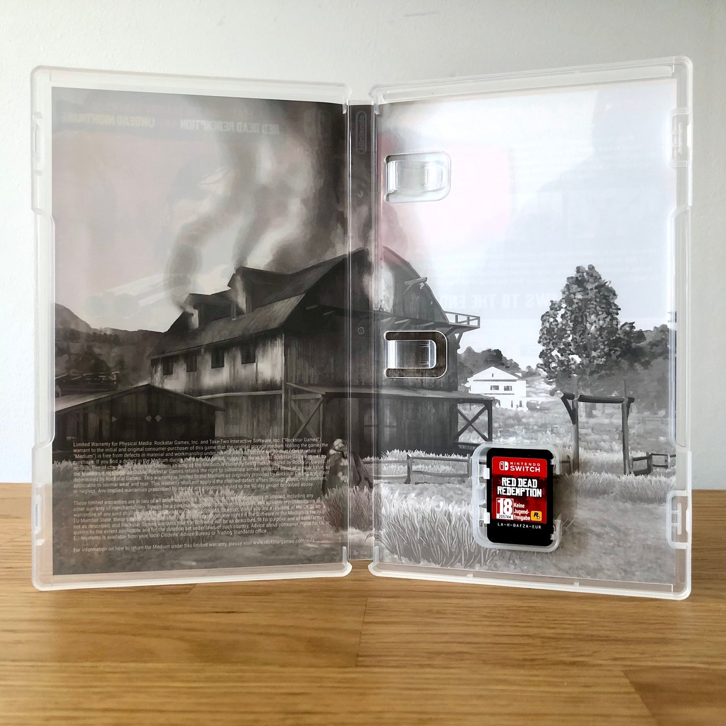 Inside the case of Red Dead Redemption for Nintendo Switch, showing the cartridge and case design.