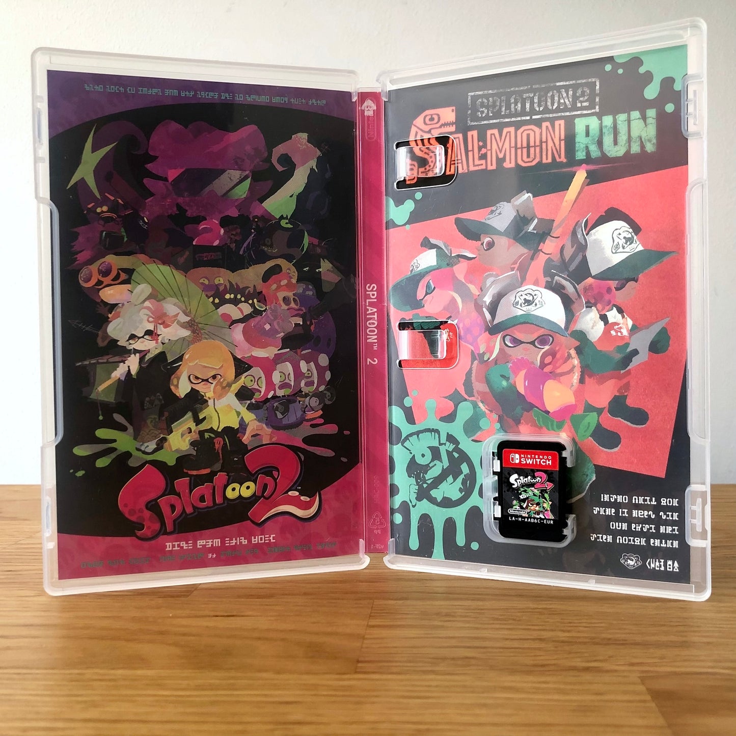 Inside the case of Splatoon 2 for Nintendo Switch, showing the cartridge and case design.