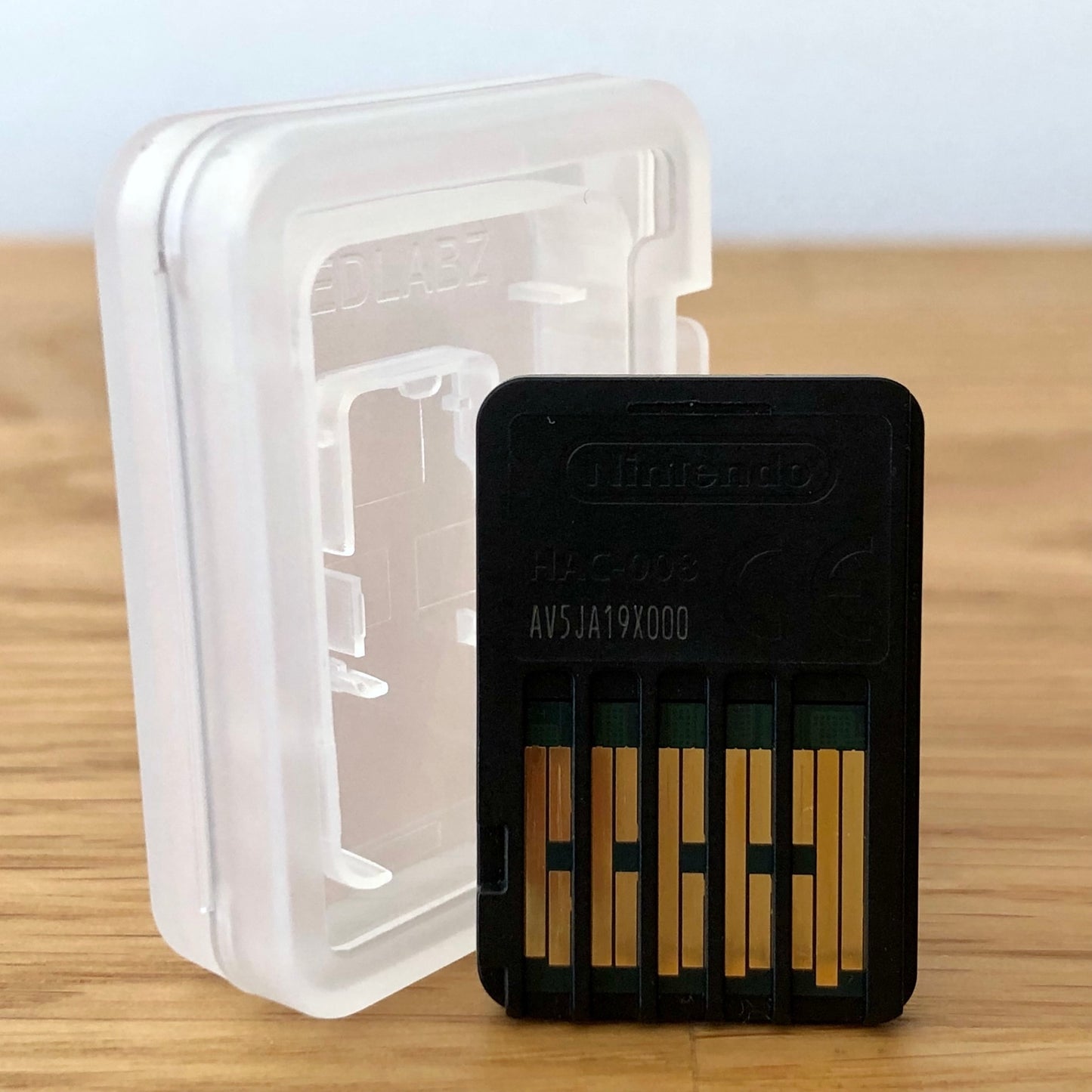 Back of Splatoon 3 Nintendo Switch game cartridge, displaying the connector pins.