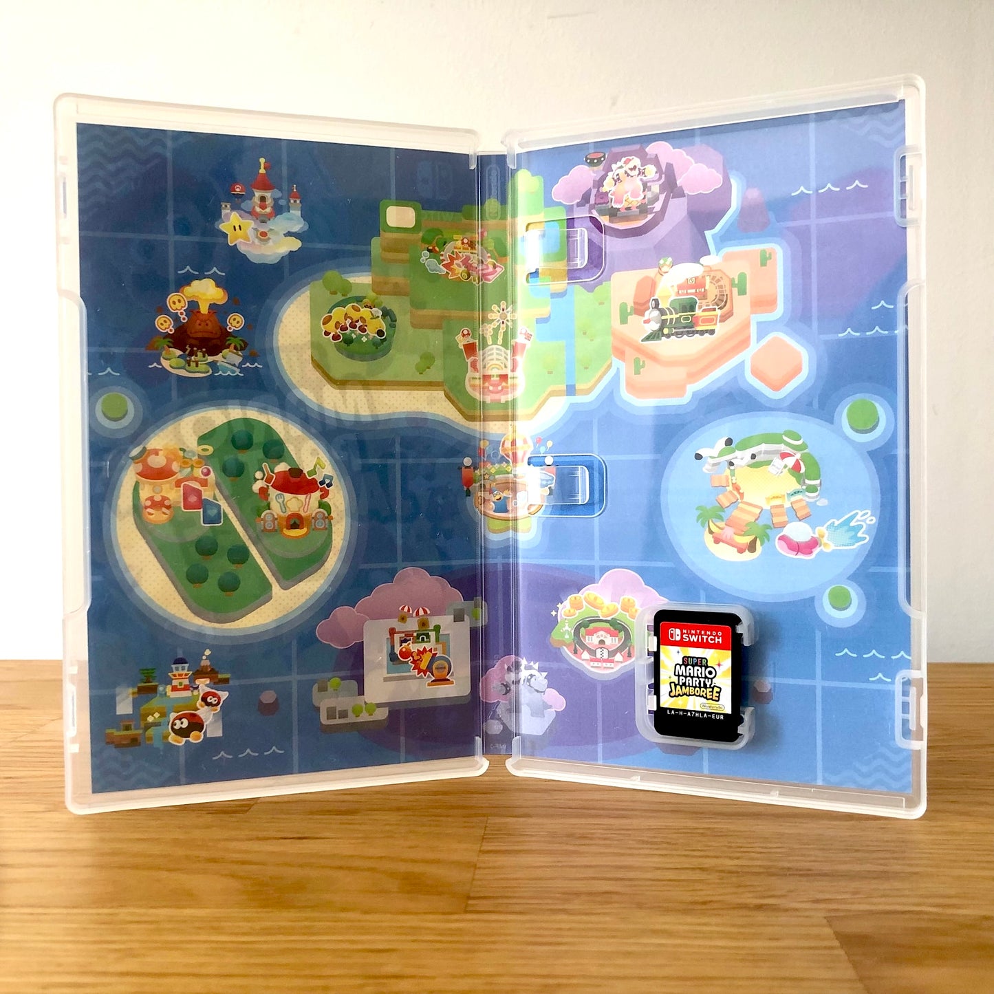 Inside the case of Super Mario Party Jamboree for Nintendo Switch, showing the cartridge and case design.