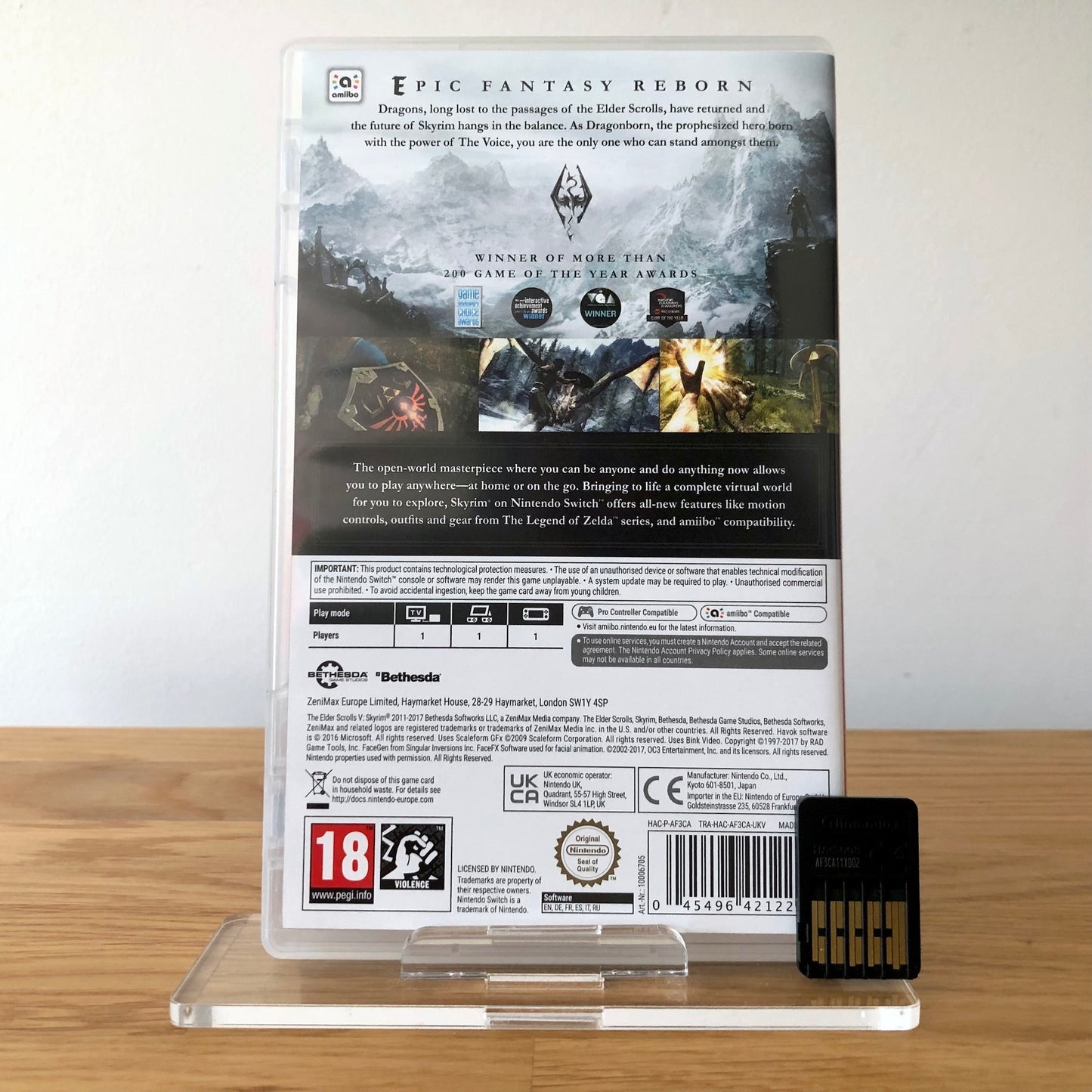 Back cover of The Elder Scrolls V: Skyrim for Nintendo Switch, showing game details, features, and back of cartridge.