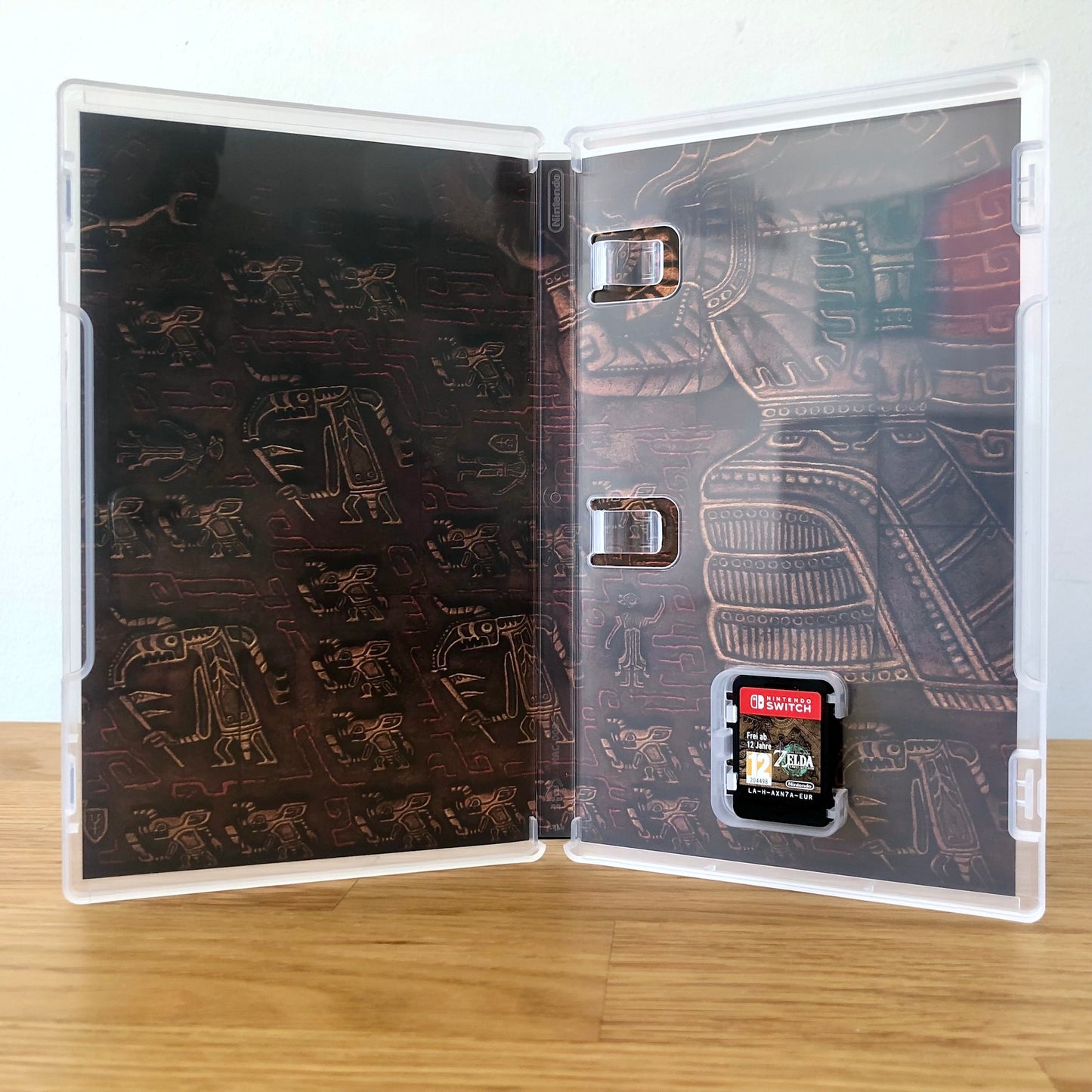 Inside the case of The Legend of Zelda: Tears of the Kingdom for Nintendo Switch, showing the cartridge and case design.