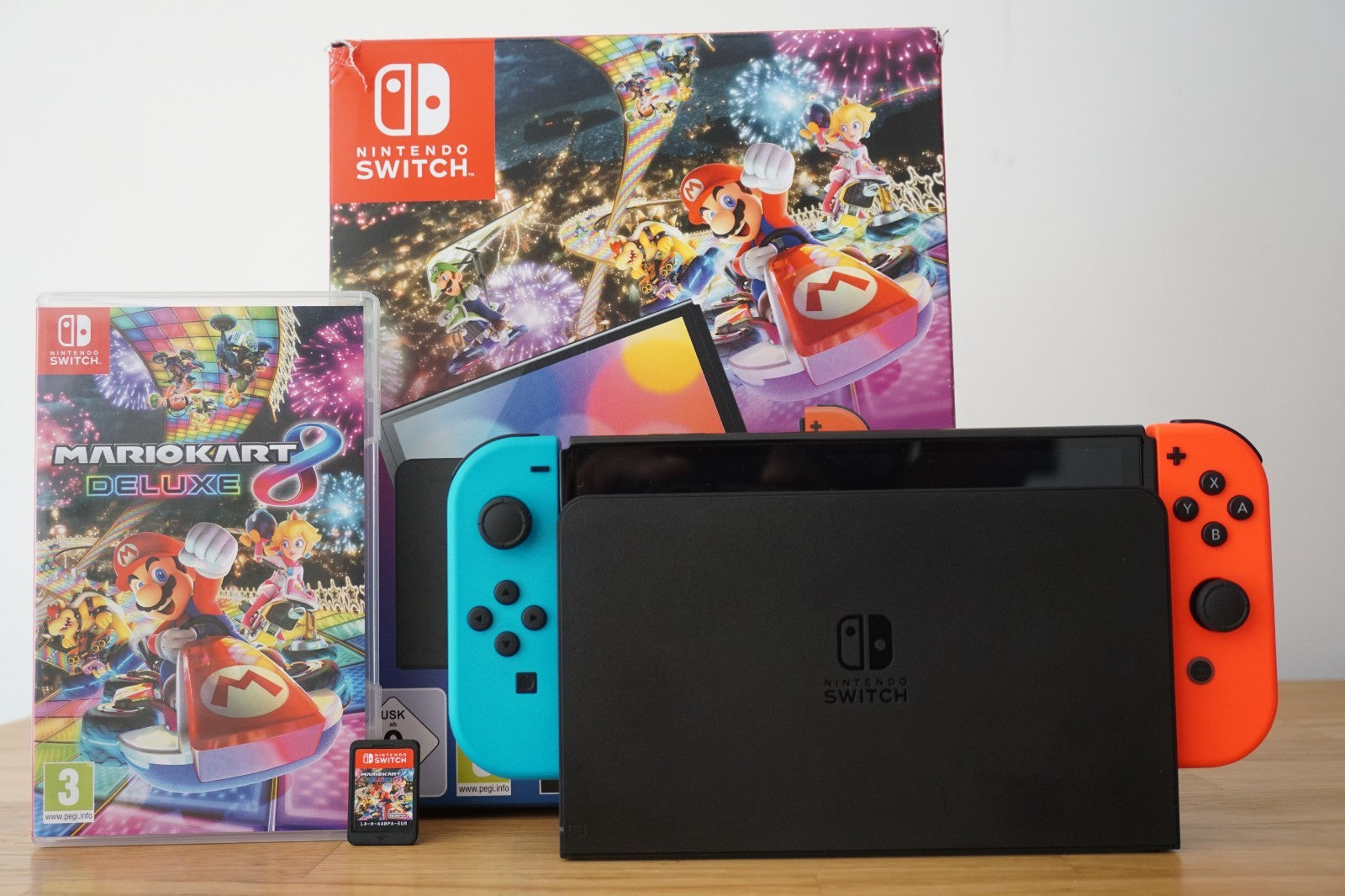 Nintendo Switch OLED Console 64GB Bundle | Neon Blue & Red | Mario Kart 8 Deluxe