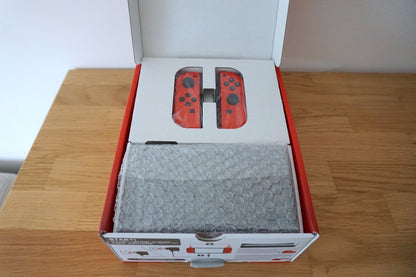 Nintendo Switch OLED 64GB 🪼Mario Red Edition Bundle + 4 Mario Games 🚚 Same Day