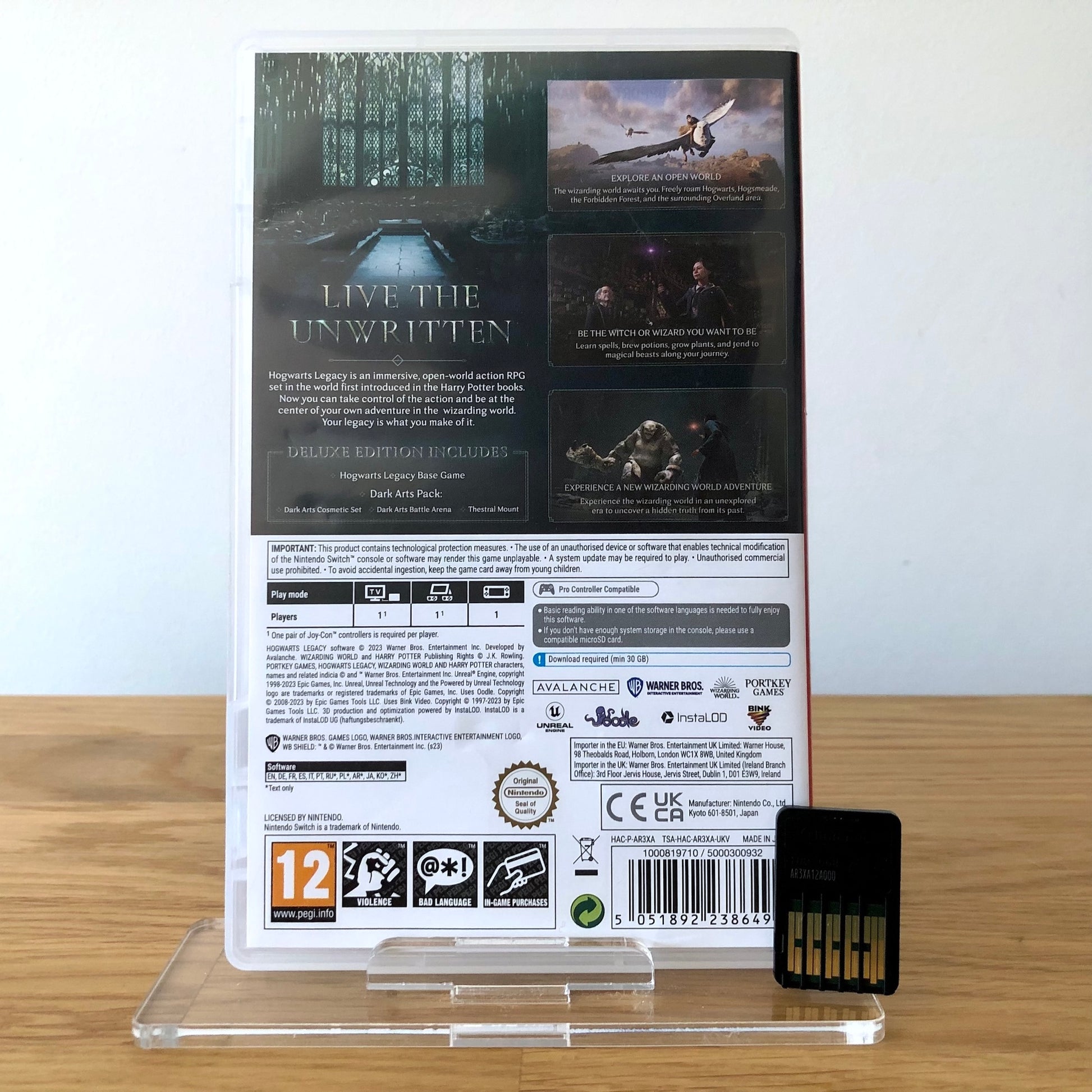Back cover of Hogwarts Legacy for Nintendo Switch, showing game details, features, and back of cartridge.