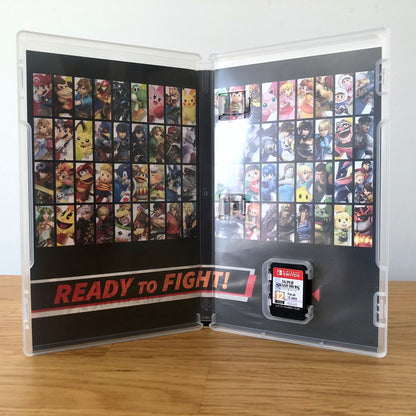 Inside the case of Super Smash Bros. Ultimate for Nintendo Switch, showing the cartridge and case design.  