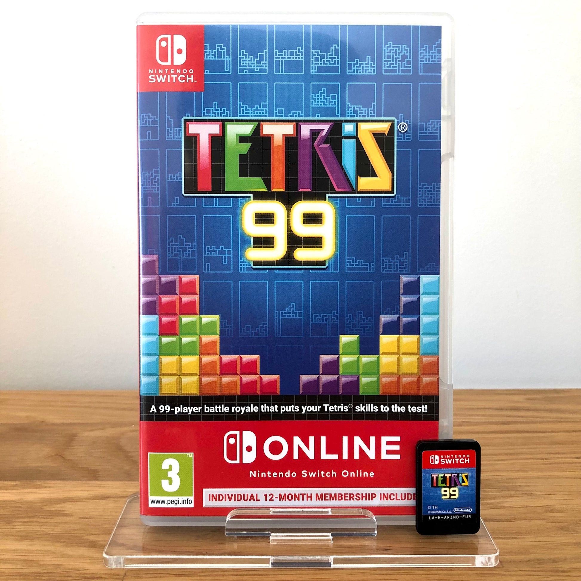 Front case cover of Tetris 99 for Nintendo Switch, featuring game artwork, title, and front of cartridge.