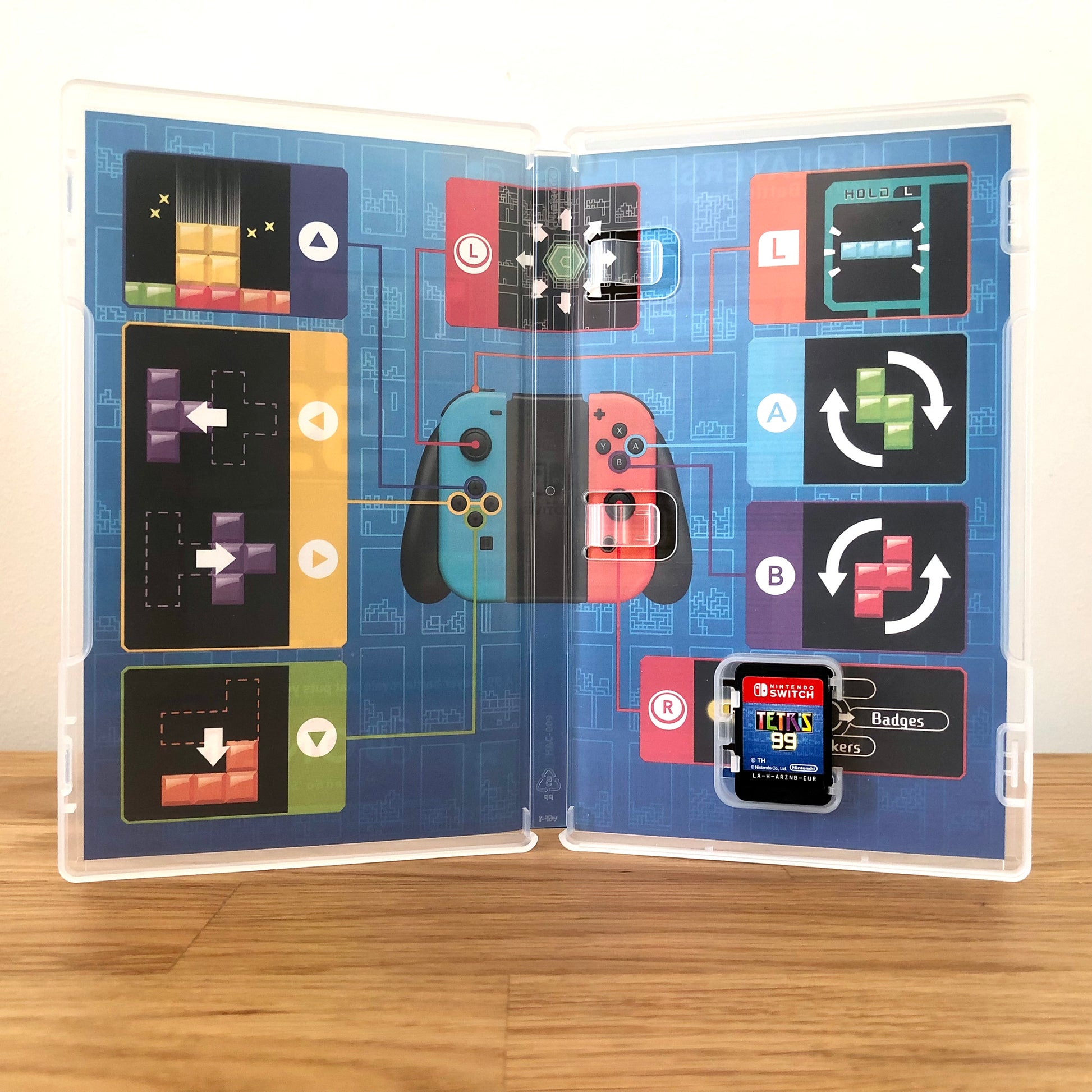 Inside the case of Tetris 99 for Nintendo Switch, showing the cartridge and case design.