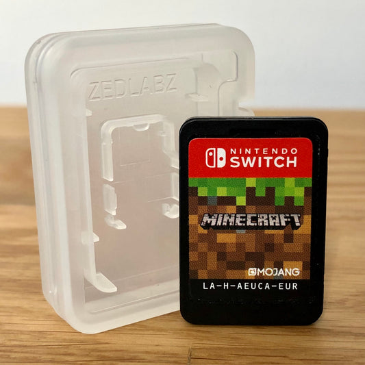 Nintendo Switch Minecraft game cartridge with a clear plastic case on a wooden surface