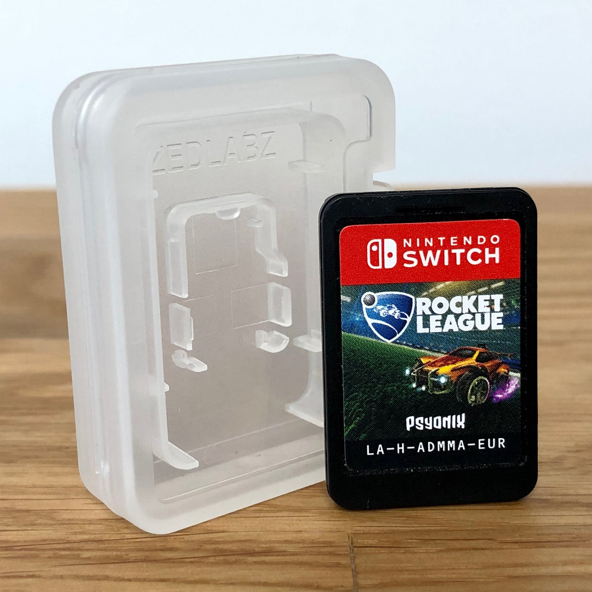 Cartridge front of Rocket League for Nintendo Switch, featuring game title.